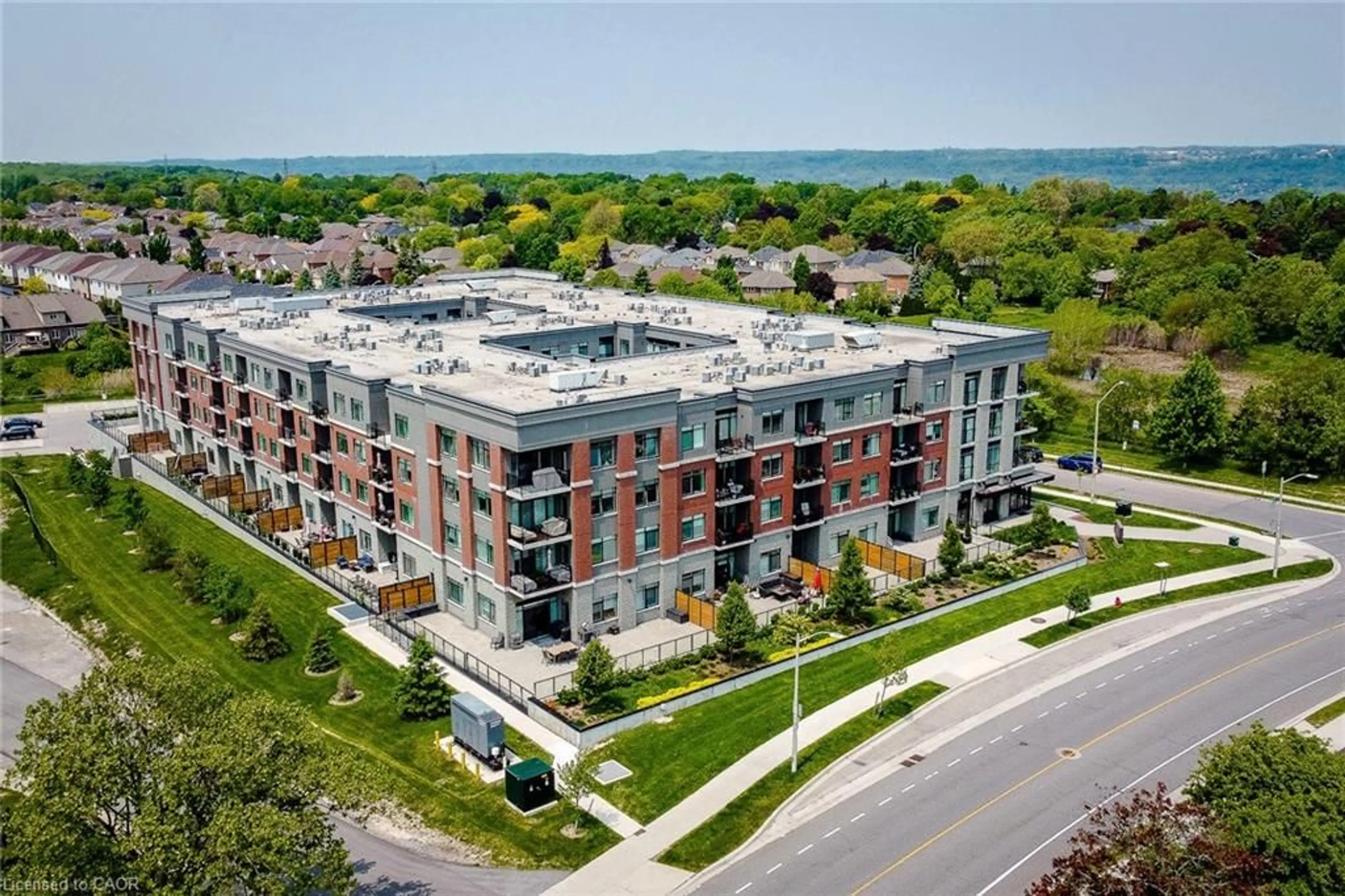 A pic from outside/outdoor area/front of a property/back of a property/a pic from drone, building for 1 Redfern Ave #217, Hamilton Ontario L9C 0E6