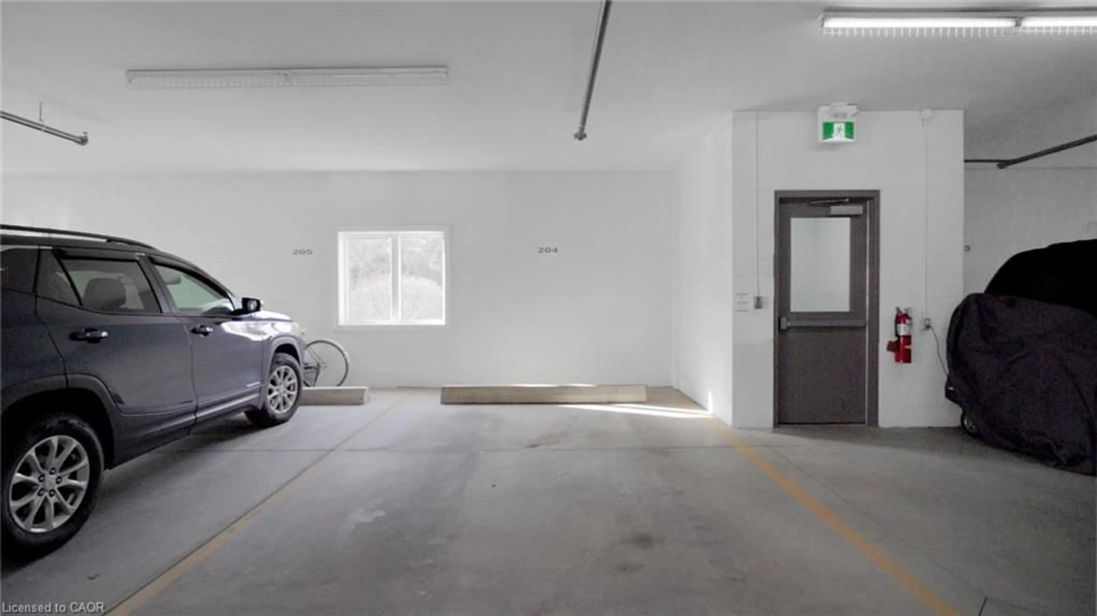 Indoor garage for 401 Birmingham St #201, Mount Forest Ontario N0G 2L2