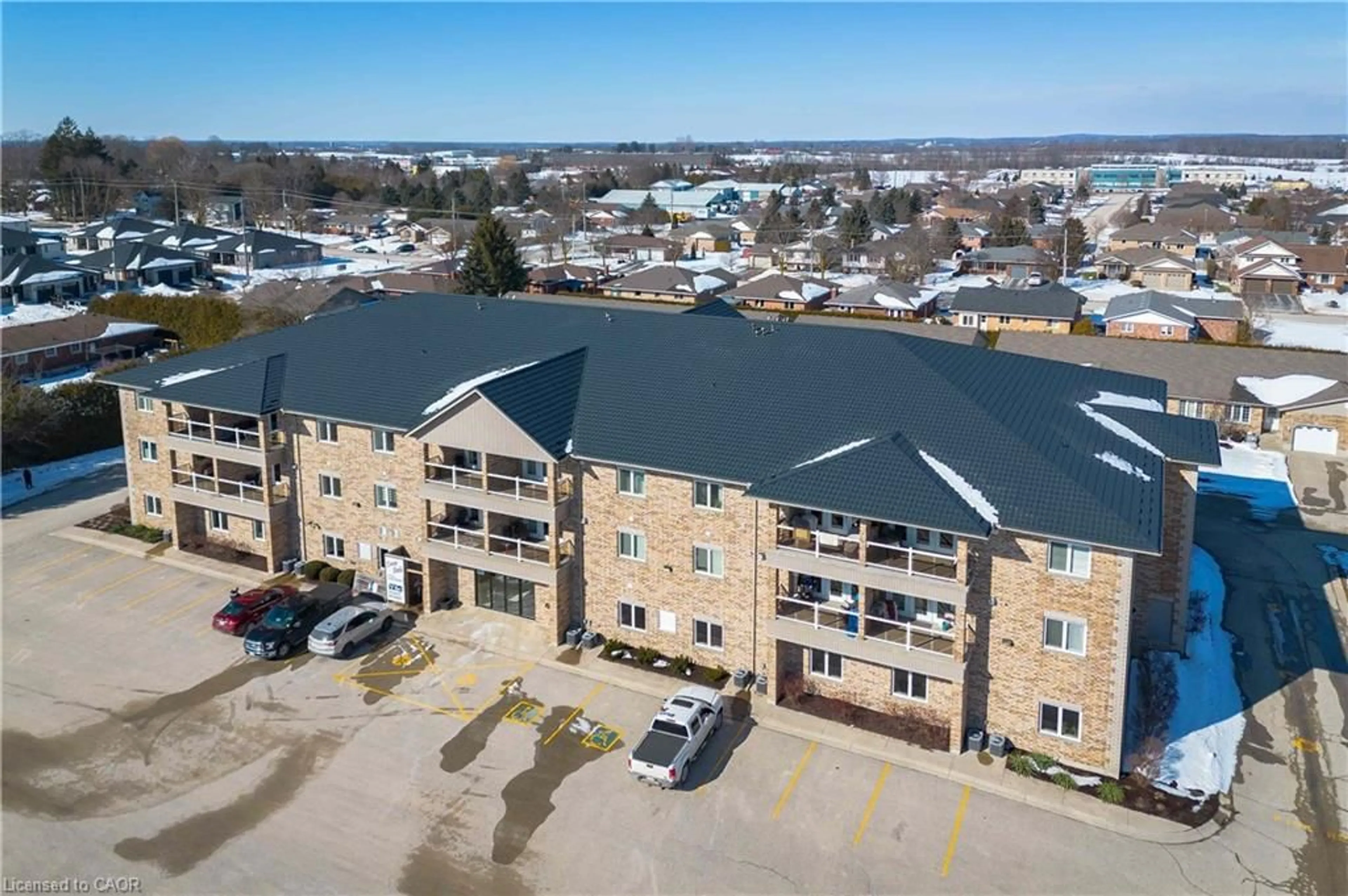 A pic from outside/outdoor area/front of a property/back of a property/a pic from drone, building for 401 Birmingham St #201, Mount Forest Ontario N0G 2L2