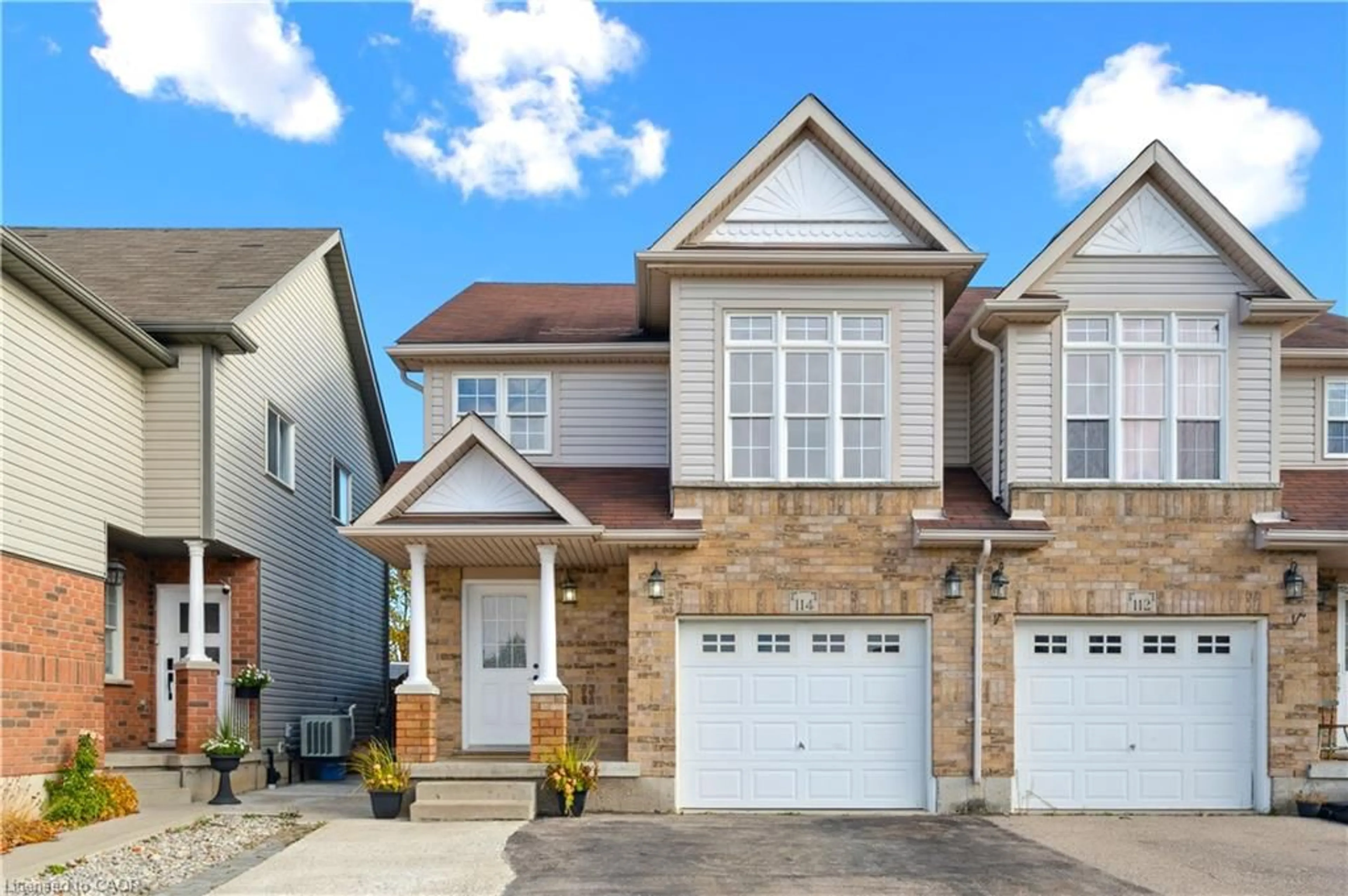 Home with brick exterior material, street for 114 Woodbine Ave, Kitchener Ontario N2R 1X4