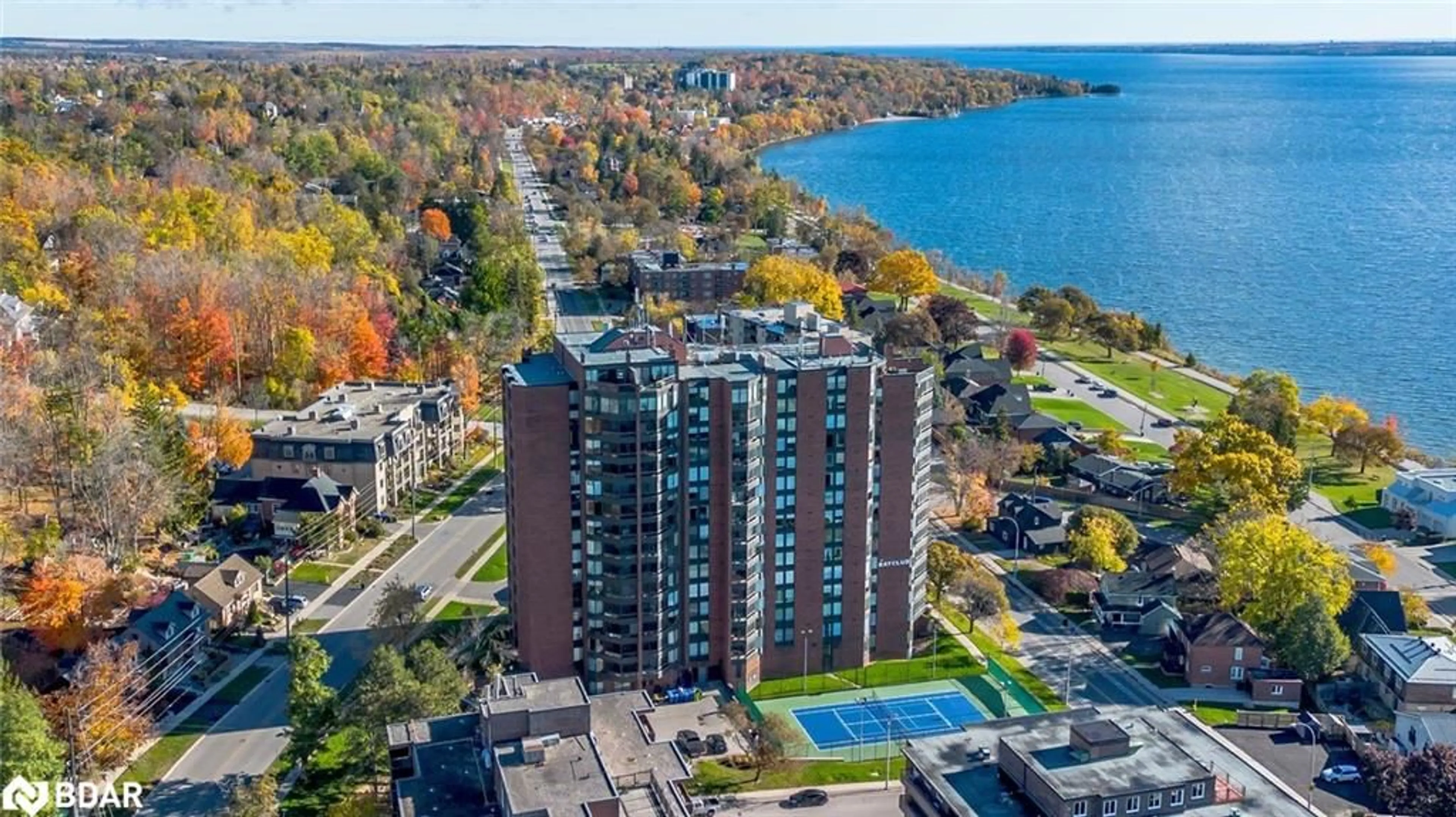 A pic from outside/outdoor area/front of a property/back of a property/a pic from drone, water/lake/river/ocean view for 181 Collier St #206, Barrie Ontario L4M 5L6