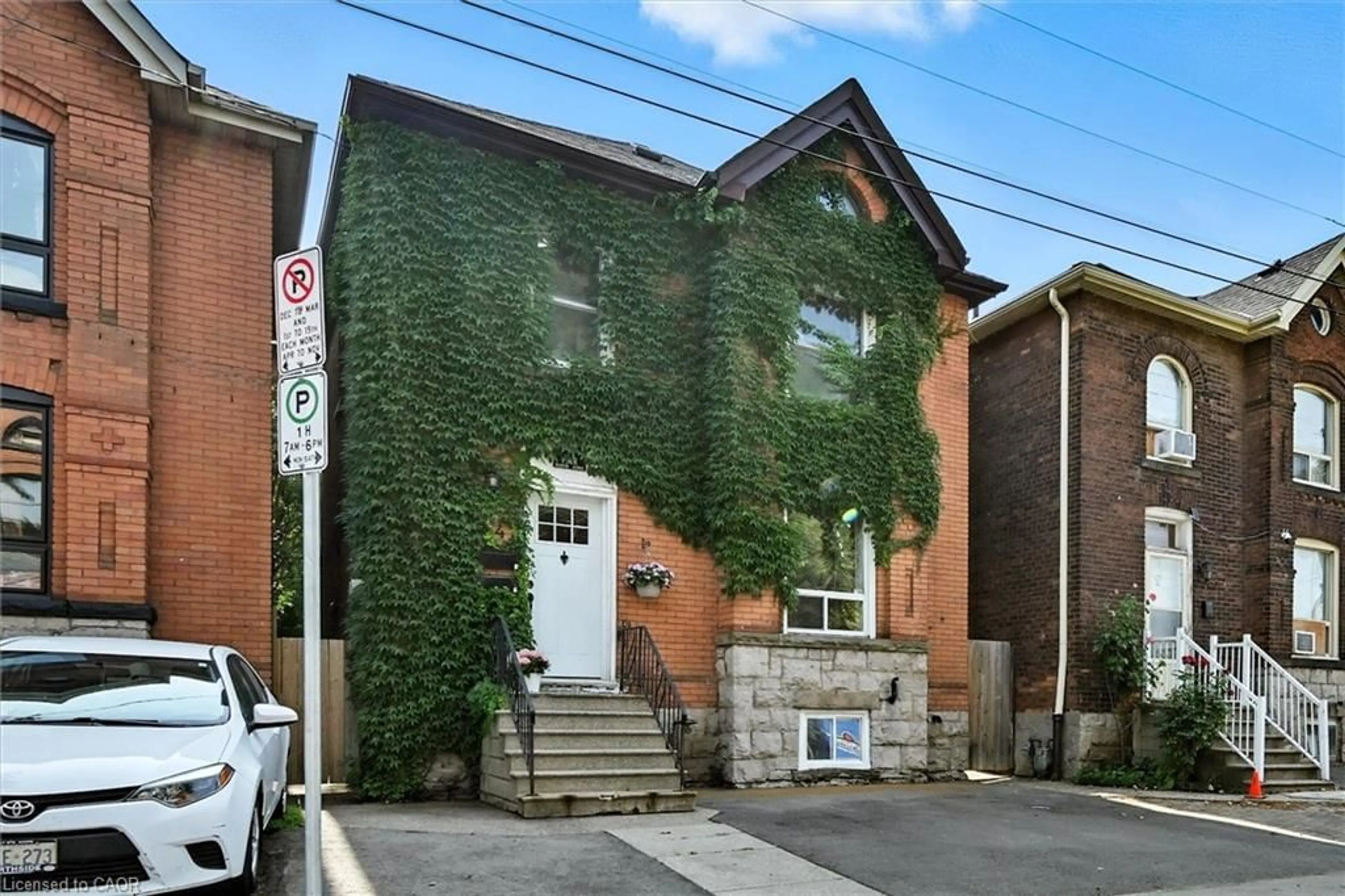 Home with brick exterior material, street for 4 Madison Ave, Hamilton Ontario L8L 5Y3