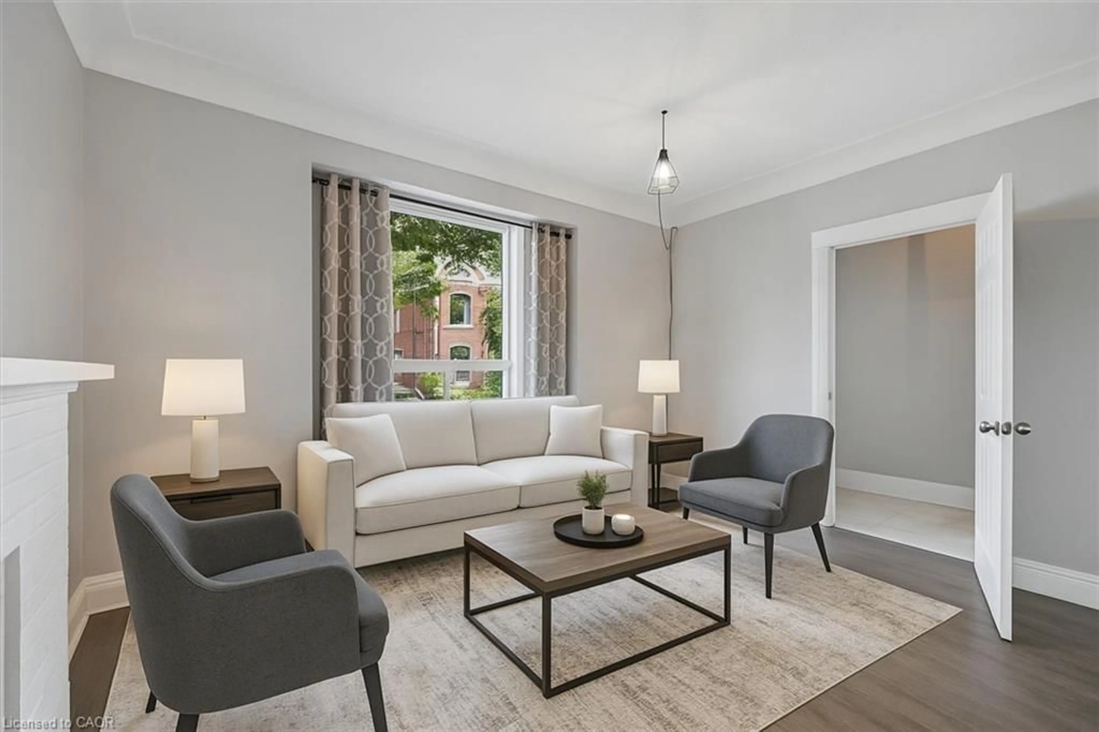 Living room with furniture, unknown for 4 Madison Ave, Hamilton Ontario L8L 5Y3