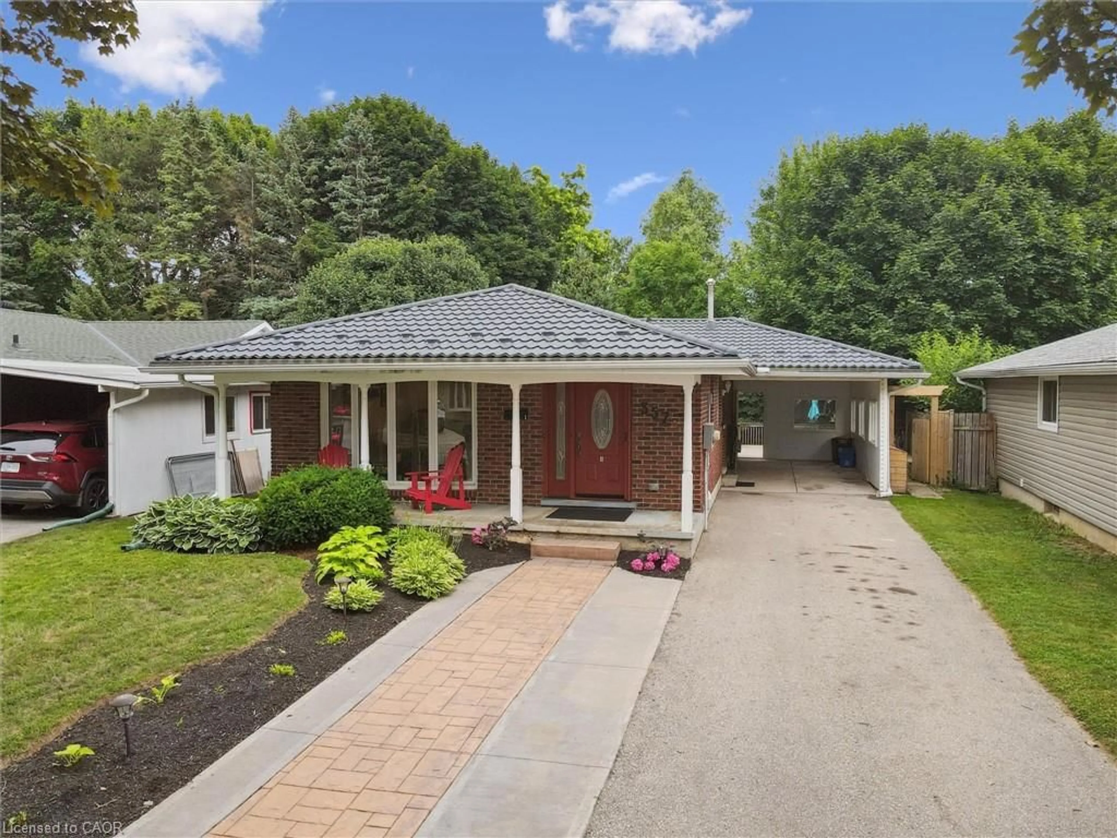 Home with brick exterior material, street for 357 Grangewood Dr, Waterloo Ontario N2K 2E4