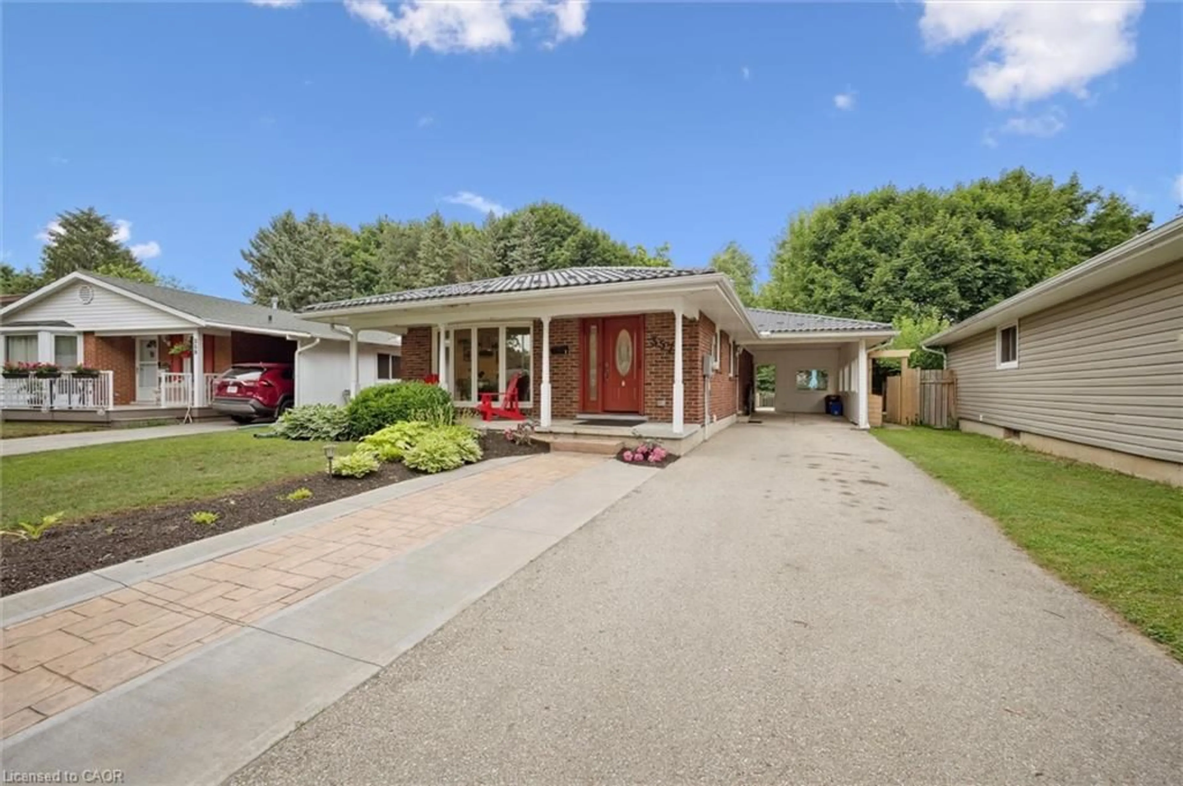 Home with brick exterior material, street for 357 Grangewood Dr, Waterloo Ontario N2K 2E4