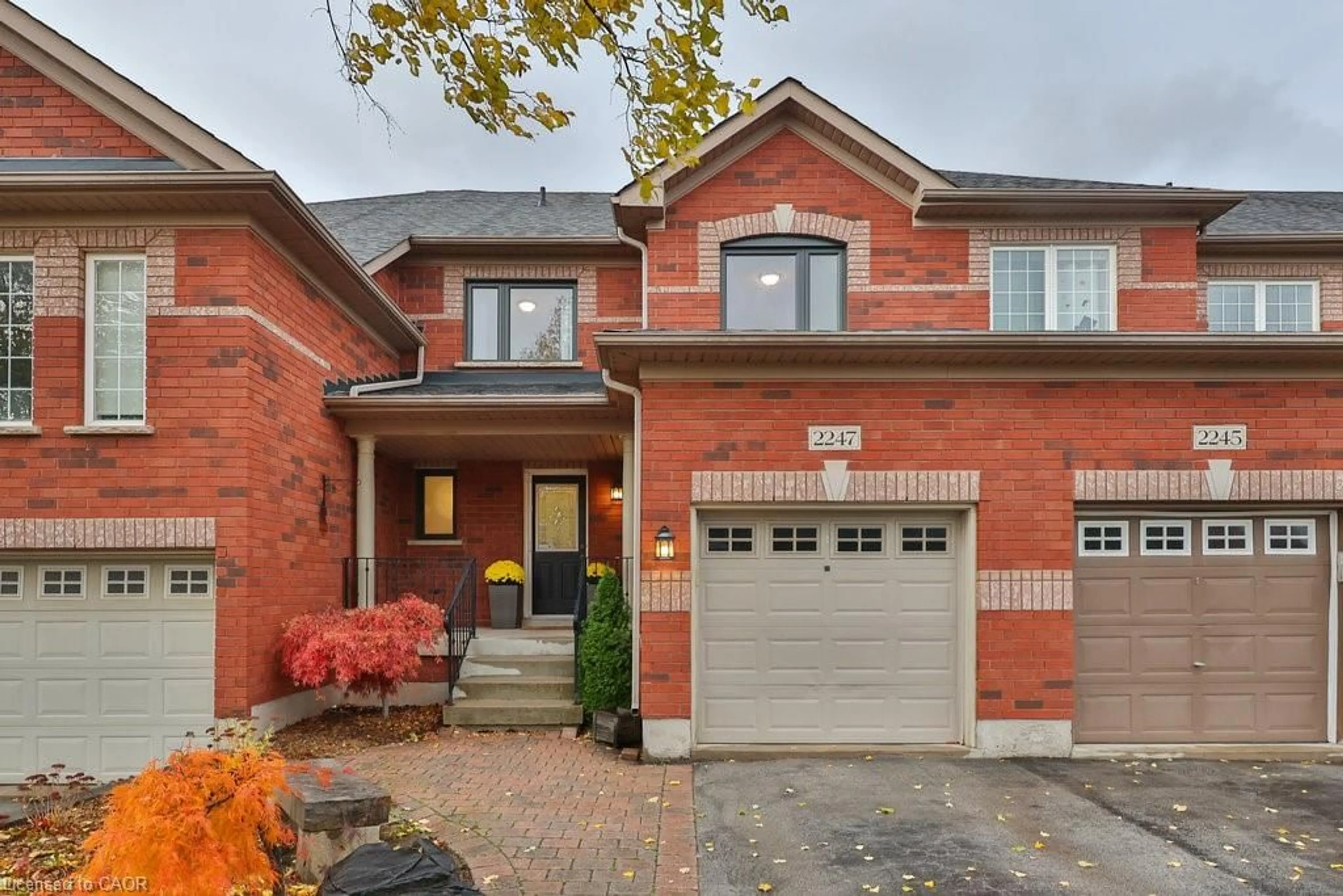 Home with brick exterior material, street for 2247 Hummingbird Way, Oakville Ontario L6M 3Z7