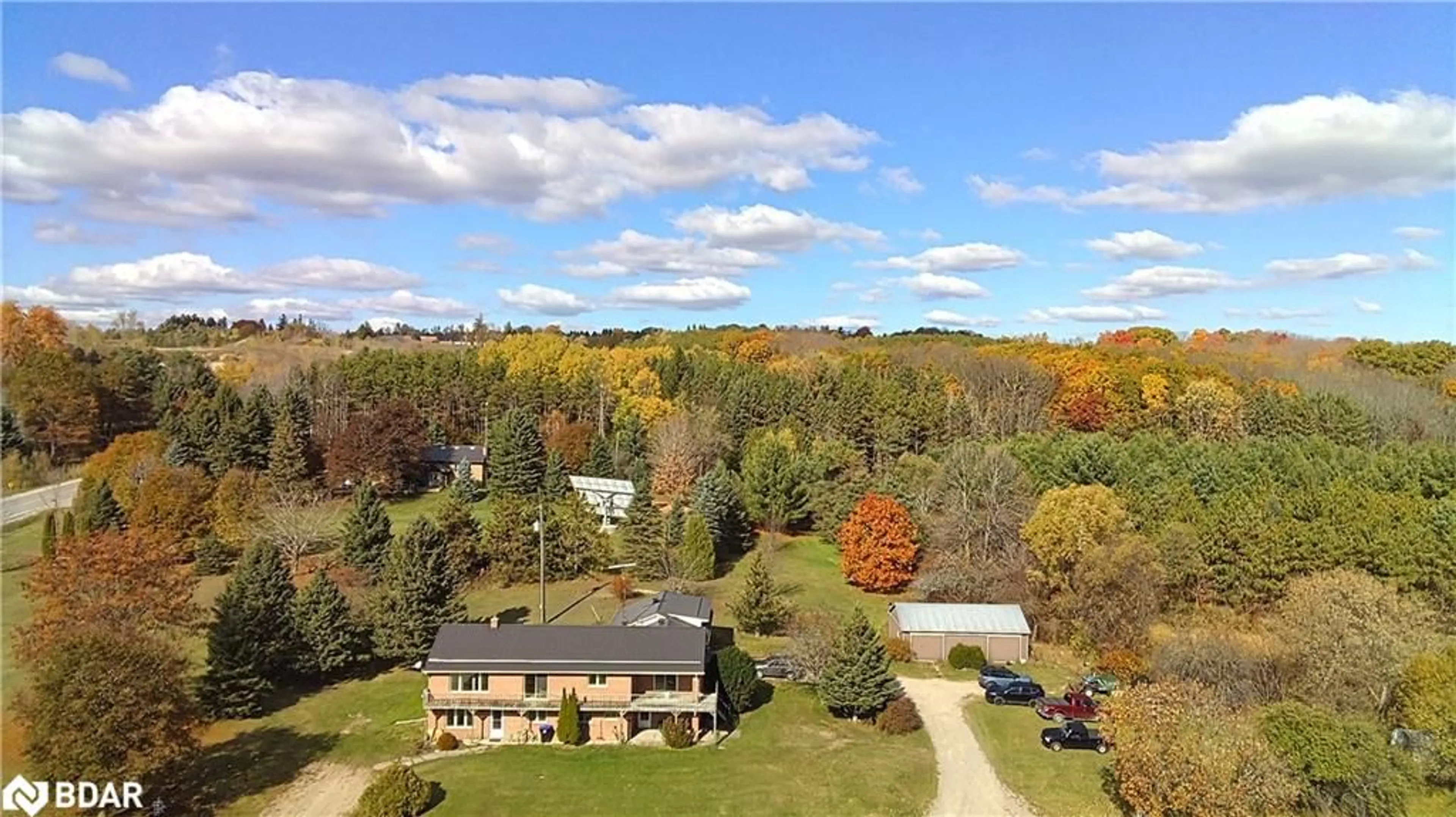 A pic from outside/outdoor area/front of a property/back of a property/a pic from drone, unknown for 1973 10th Side Road, New Tecumseth Ontario L3Z 2A4