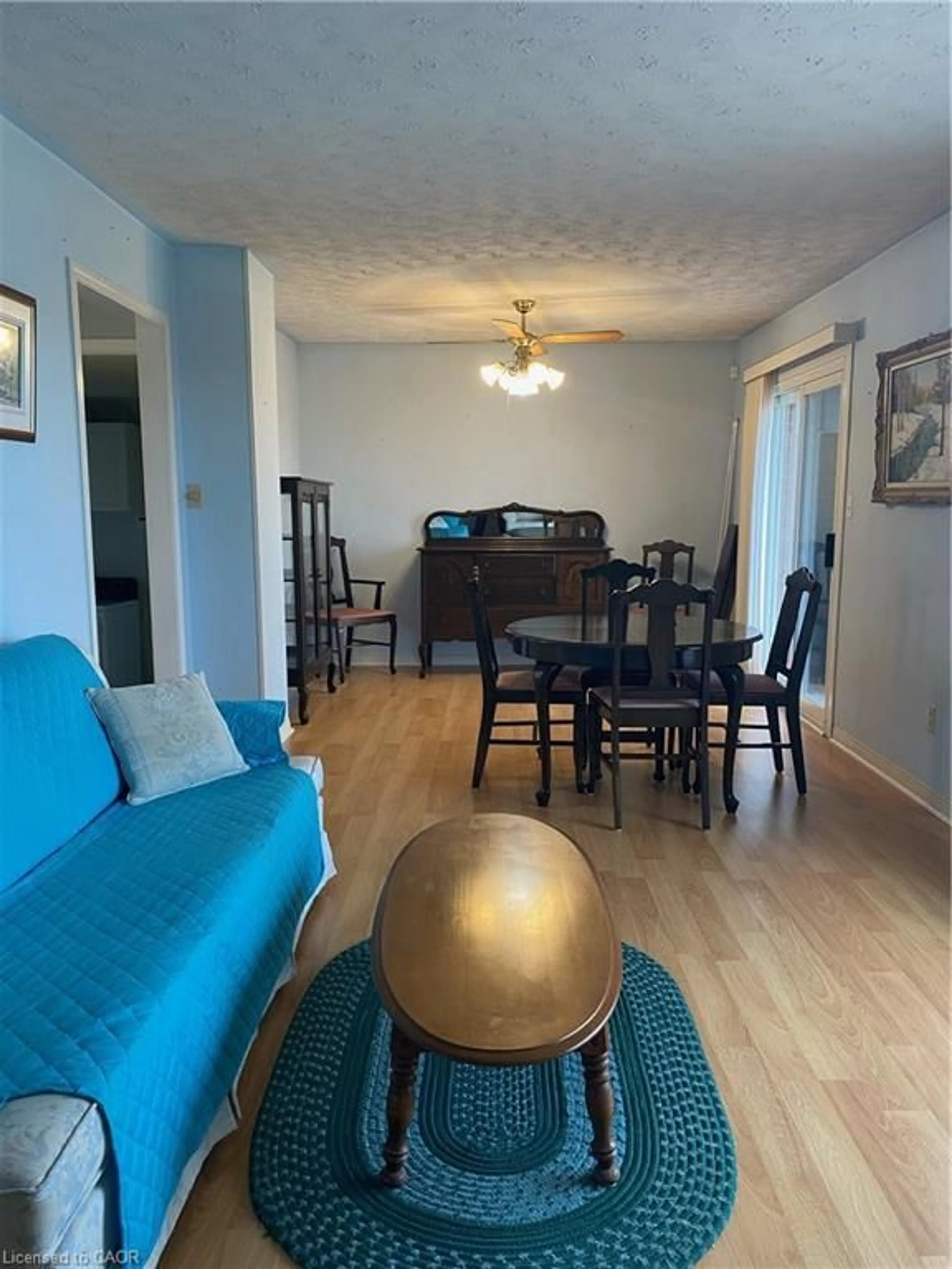 Living room with furniture, wood/laminate floor for 4618 Highway 3, Cayuga Ontario N0A 1E0