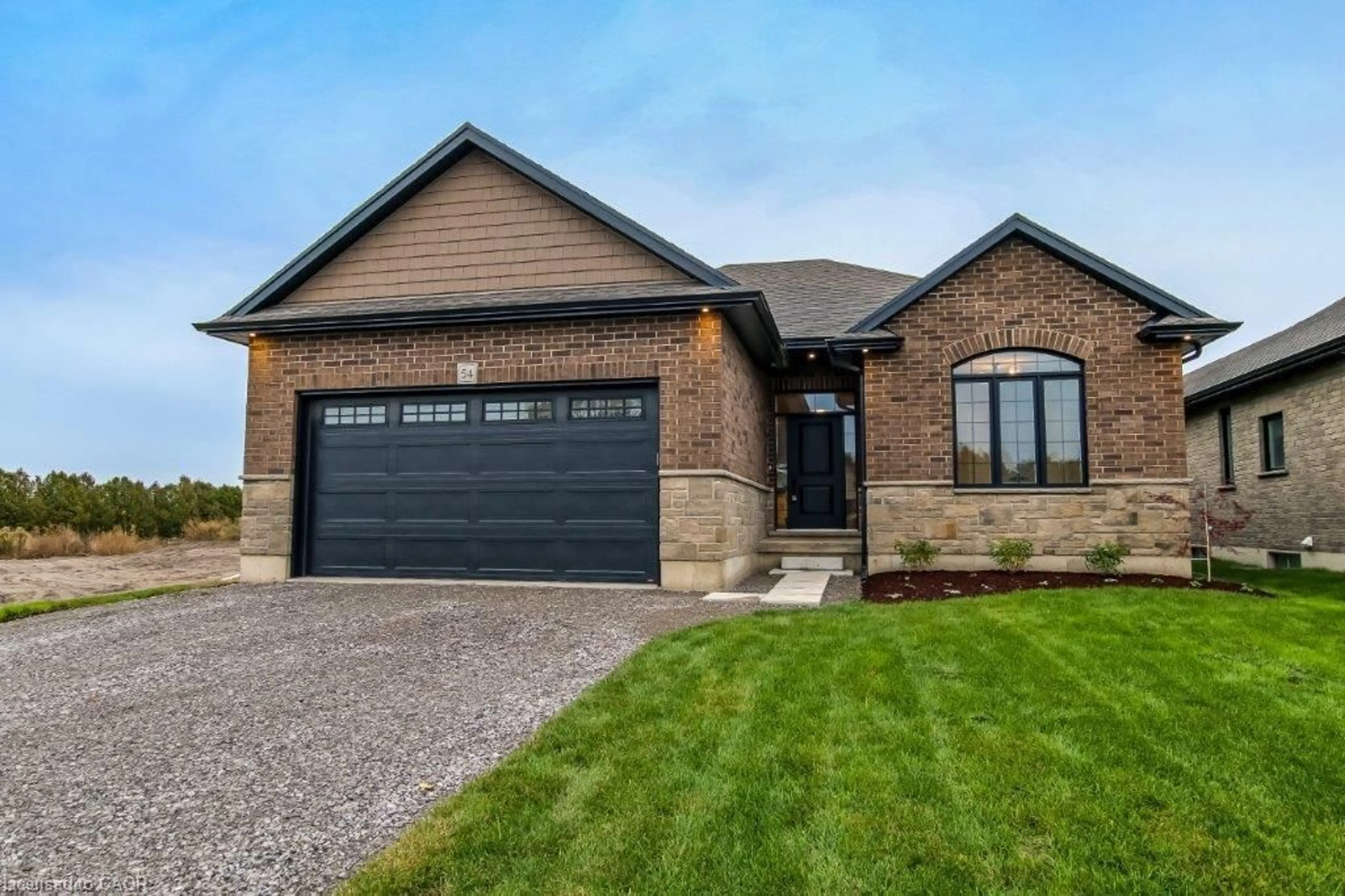 Home with brick exterior material, street for 54 Duchess Dr, Delhi Ontario N4B 0B3