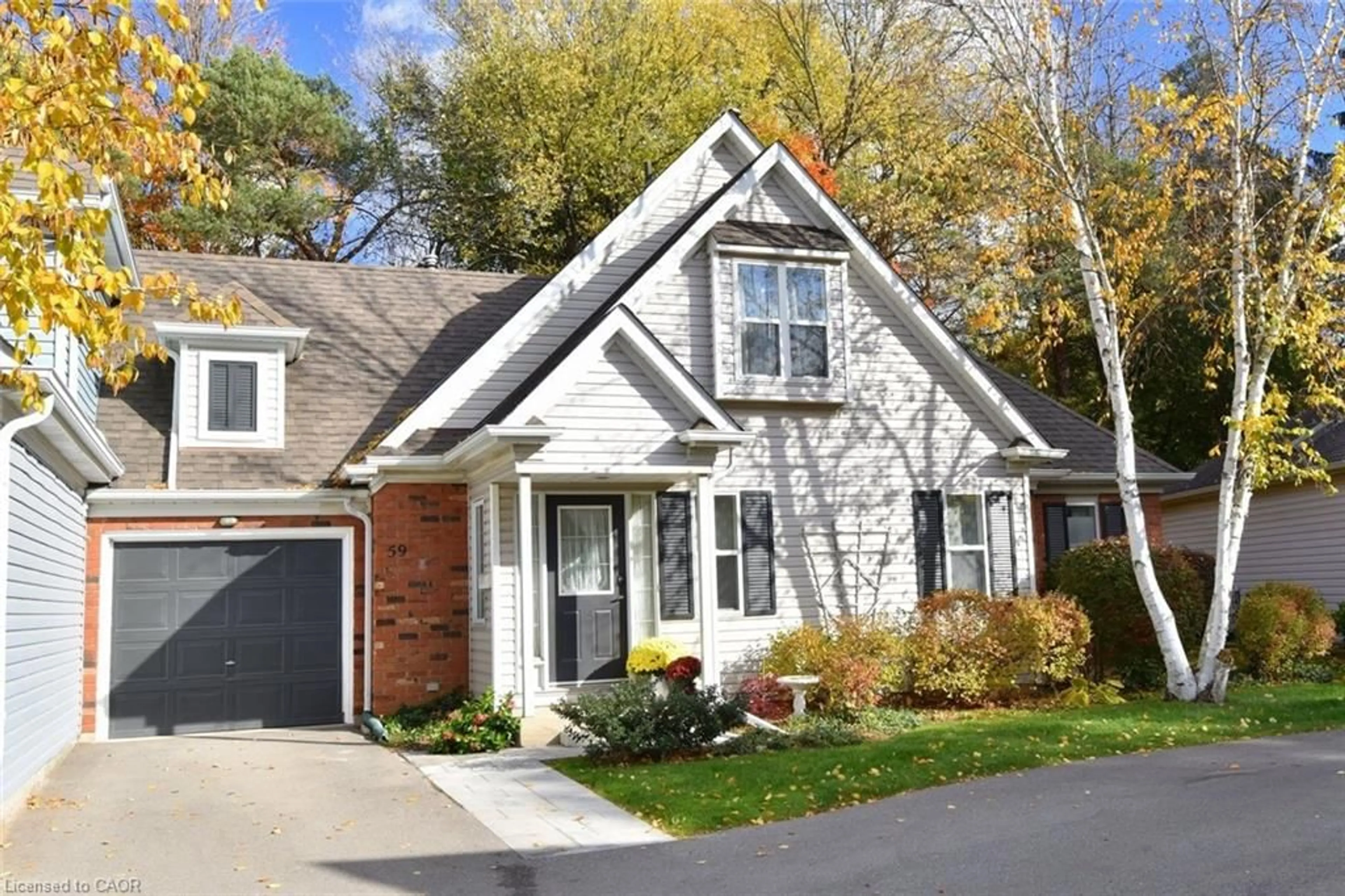 Home with brick exterior material, street for 175 Fiddlers Green Rd #59, Ancaster Ontario L9G 4X7