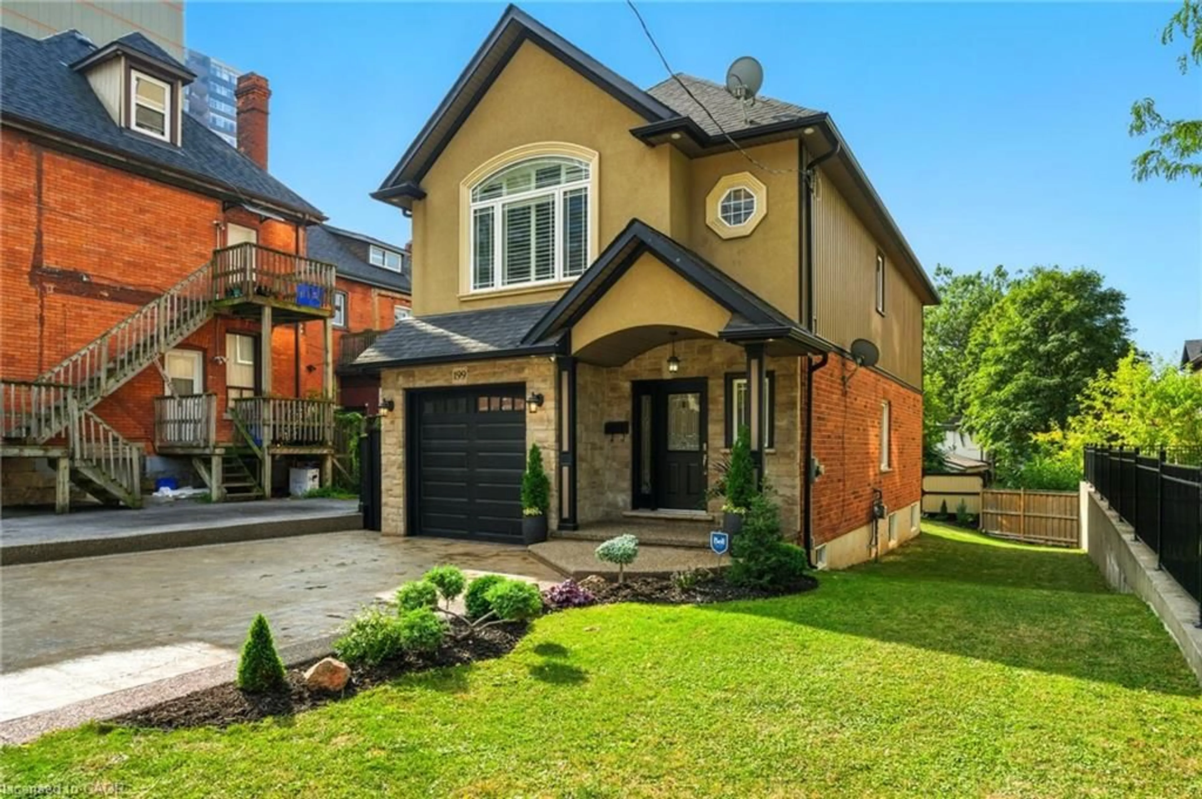 Home with brick exterior material, street for 199 Hunter St, Hamilton Ontario L8P 1R7