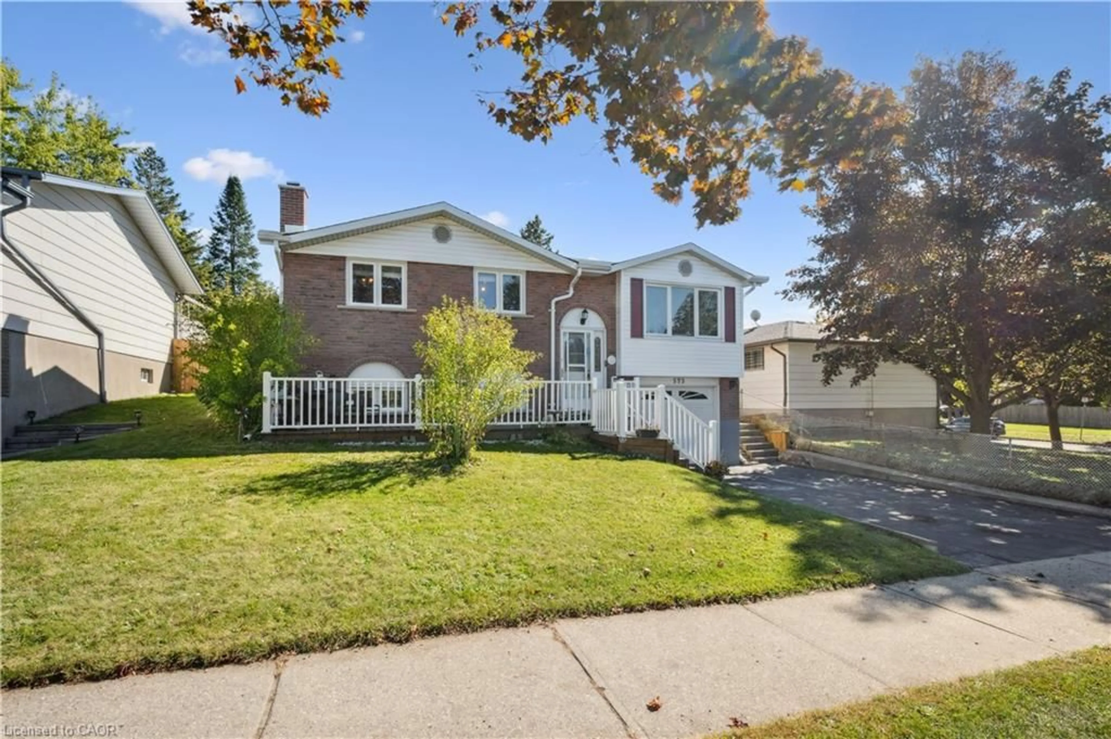 Home with vinyl exterior material, street for 573 Pioneer Dr, Kitchener Ontario N2P 1P4