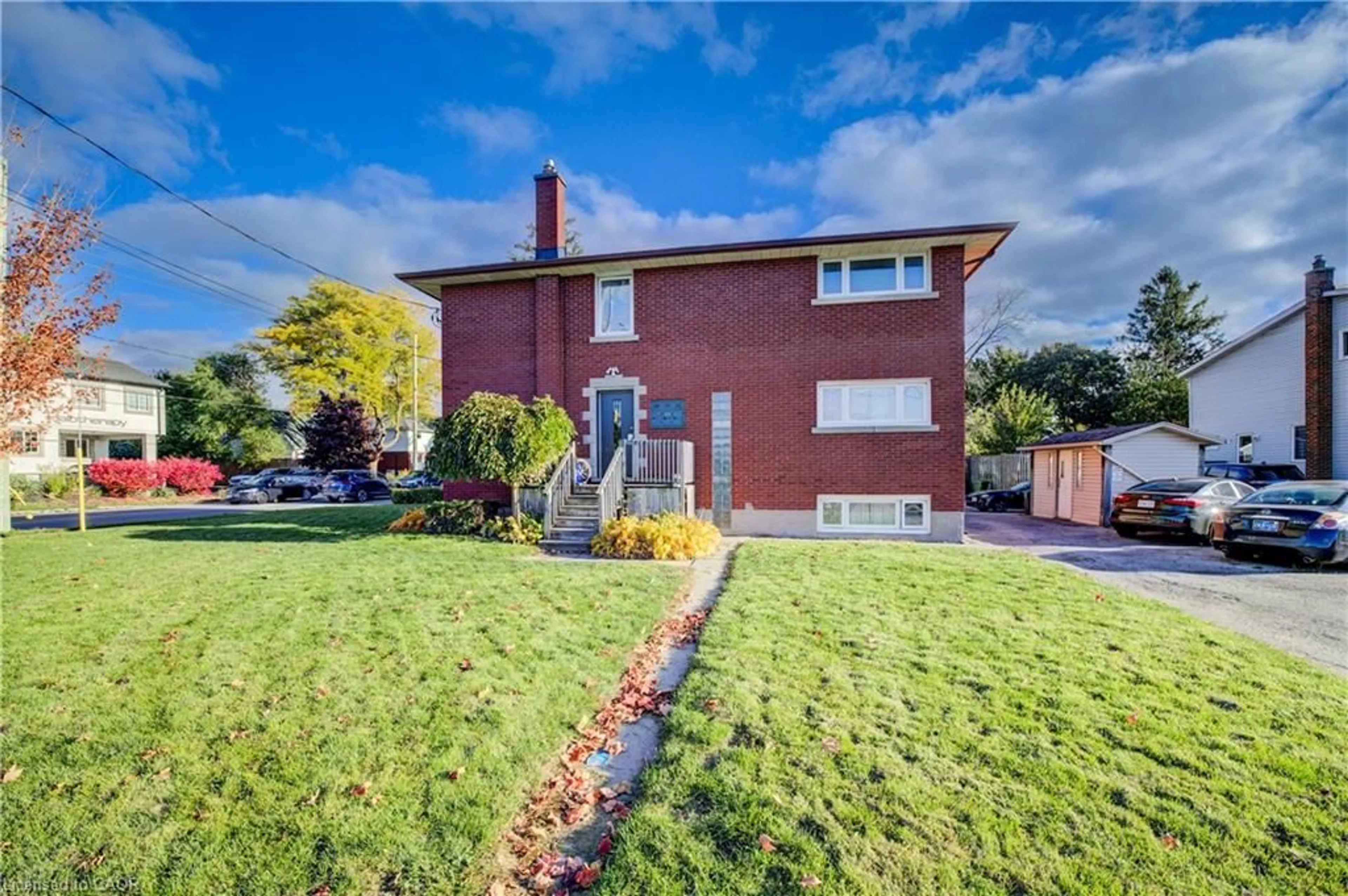 Home with brick exterior material, street for 263 Highland Rd, Kitchener Ontario N2M 3C4
