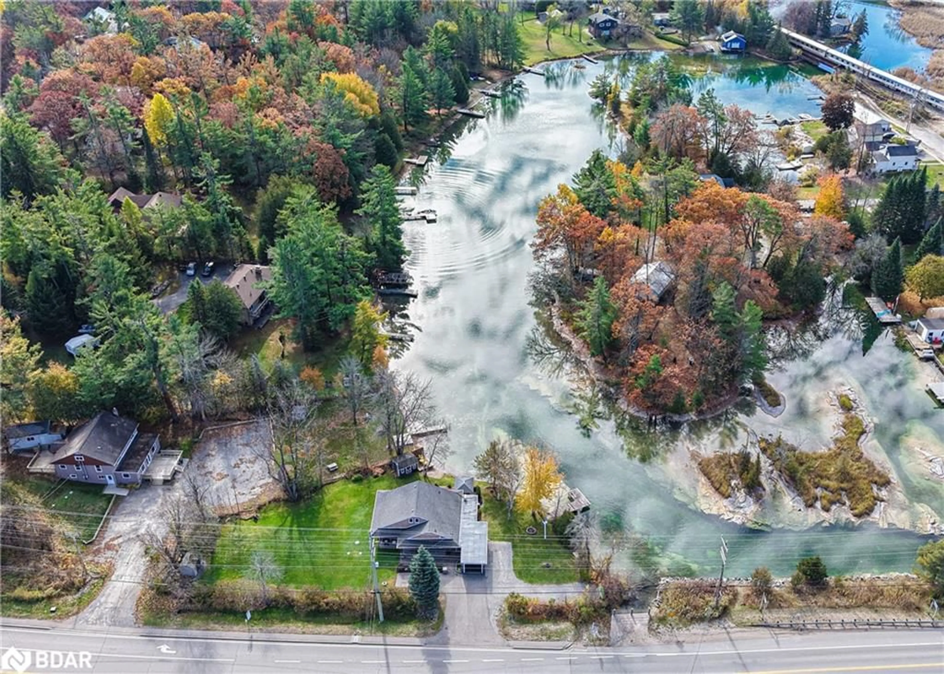A pic from outside/outdoor area/front of a property/back of a property/a pic from drone, water/lake/river/ocean view for 8222 County Rd 169 Rd, Washago Ontario L0K 2B0