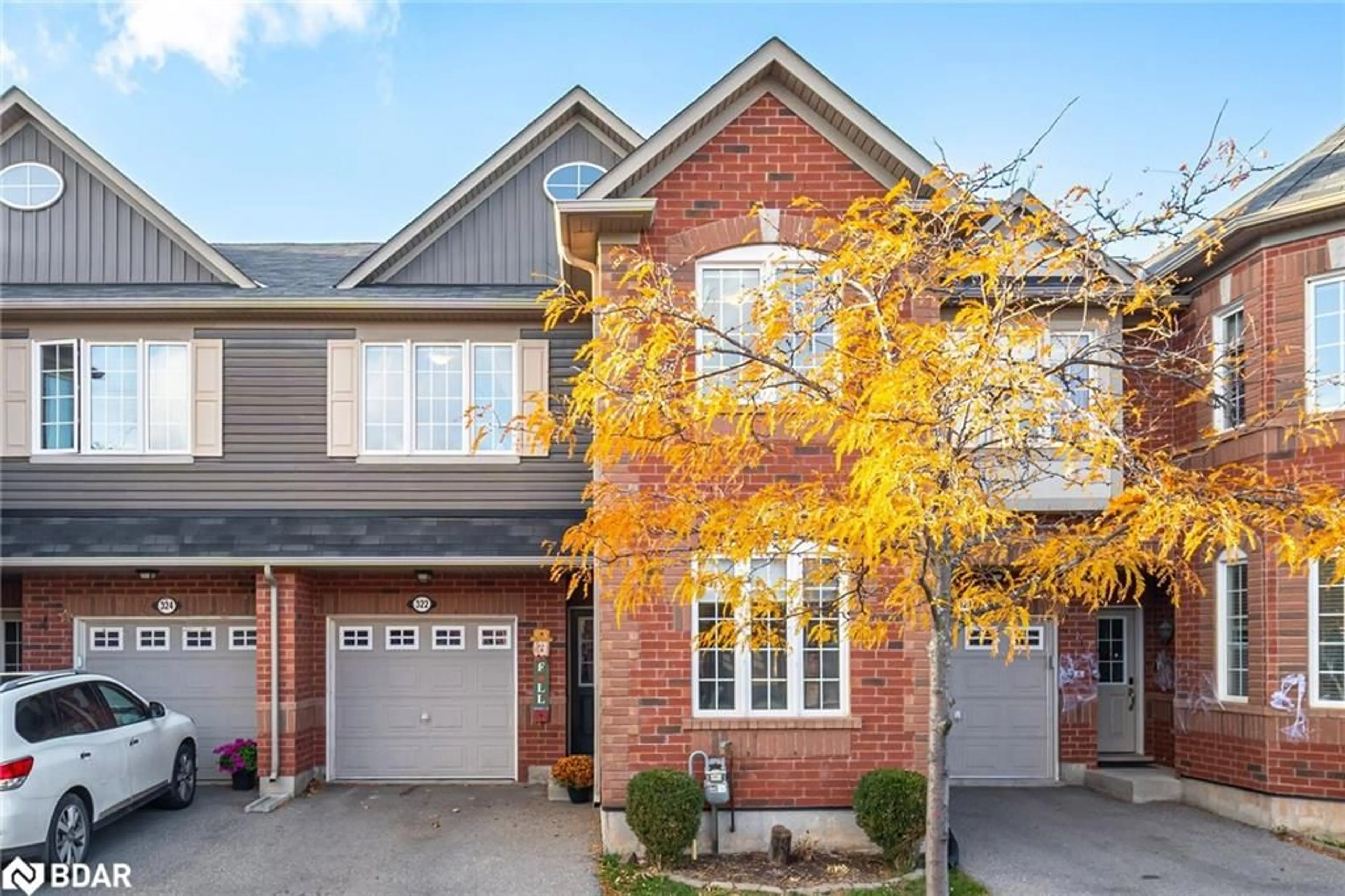 Home with brick exterior material, street for 322 Chuchmach Close, Milton Ontario L9T 8B5