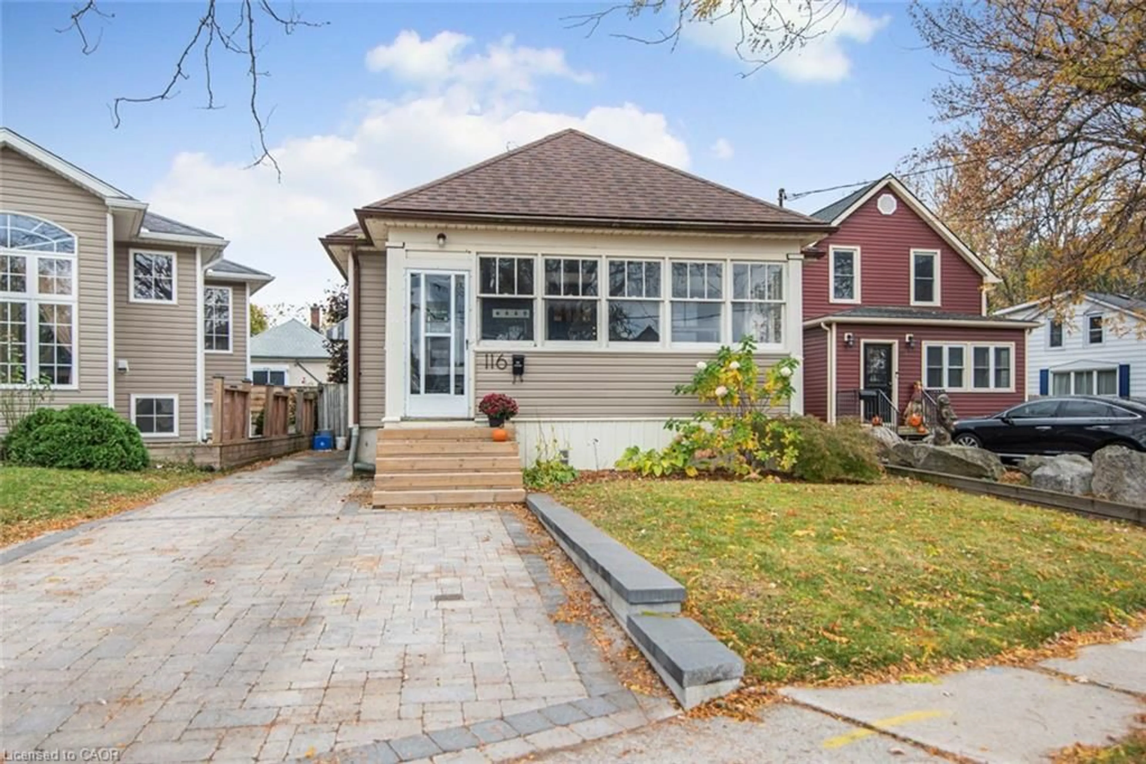 Home with brick exterior material, street for 116 Carlton St, St. Catharines Ontario L2R 1R3
