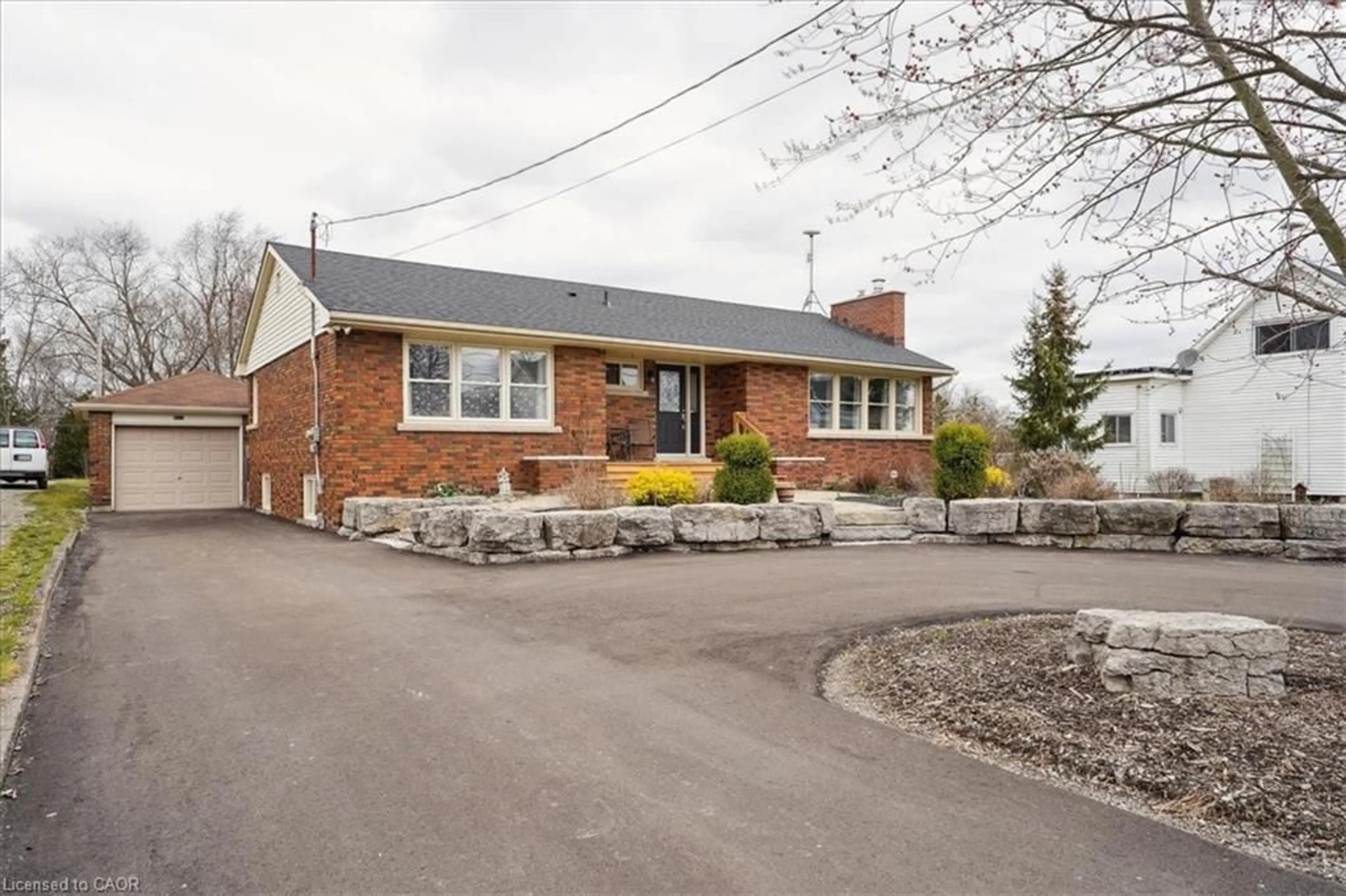 Home with brick exterior material, street for 5117 Canborough Rd, Wellandport Ontario L0R 2J0