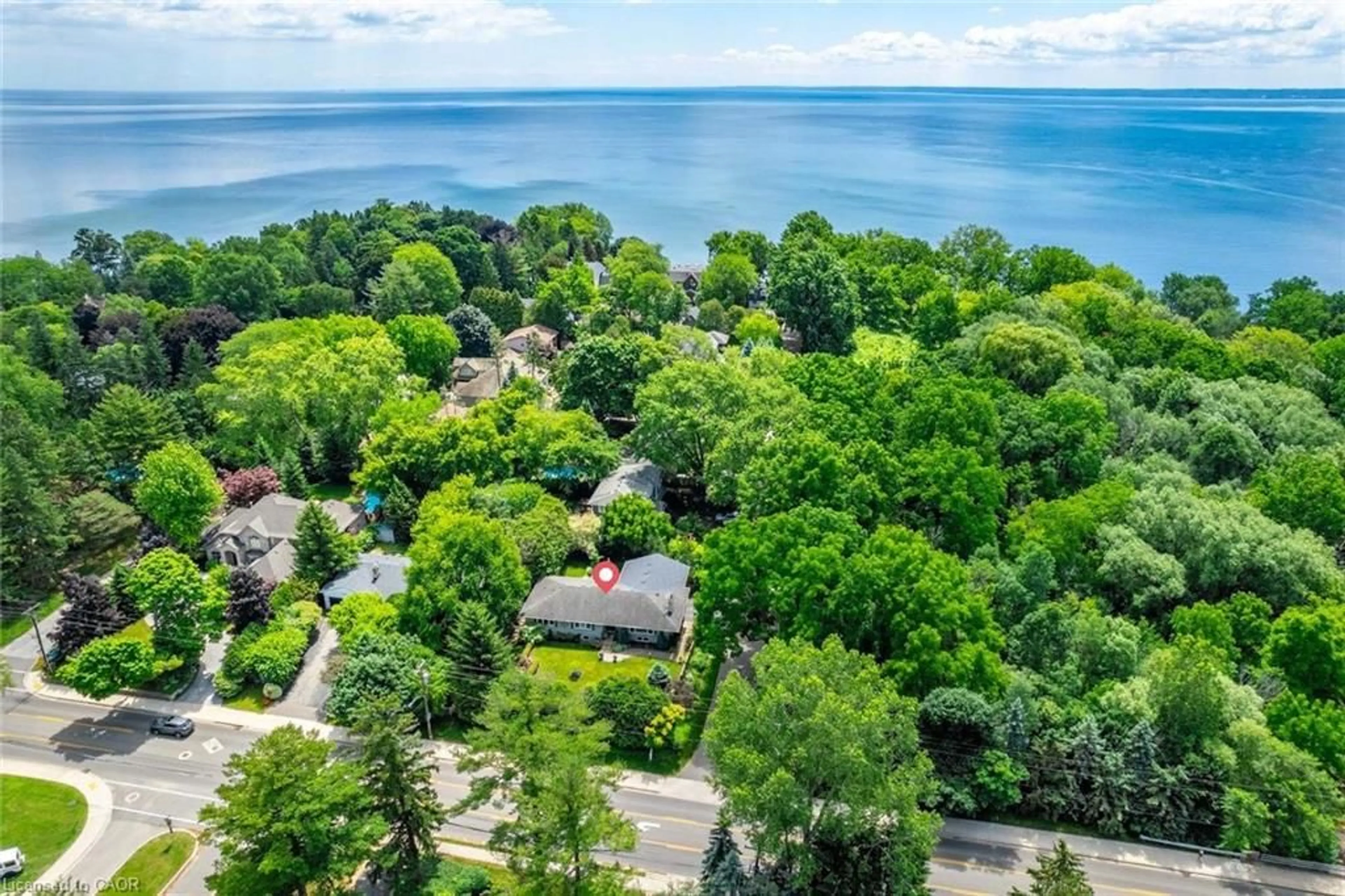 A pic from outside/outdoor area/front of a property/back of a property/a pic from drone, water/lake/river/ocean view for 4306 Lakeshore Rd, Burlington Ontario L7L 1A8