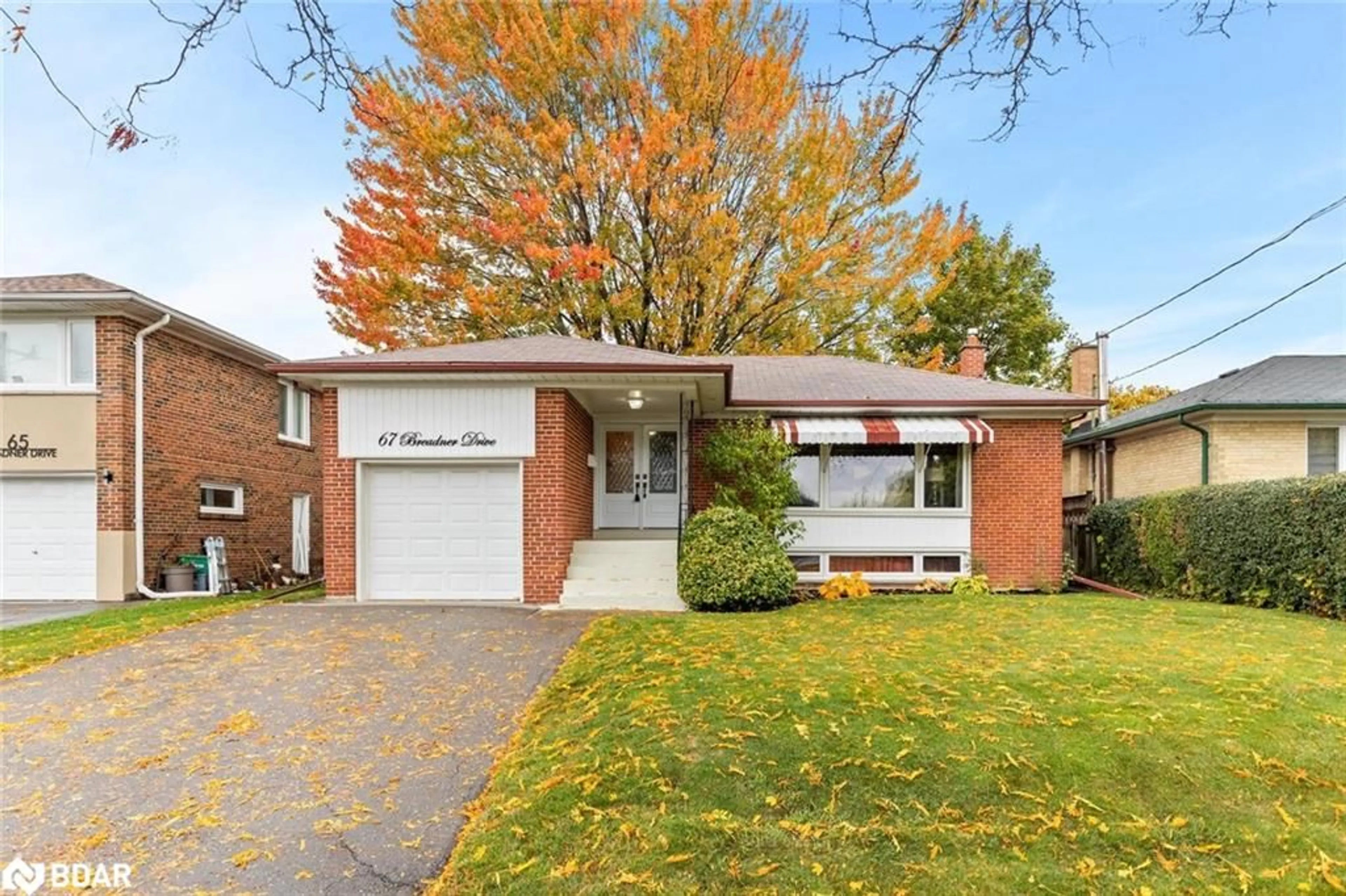 Home with brick exterior material, street for 67 Breadner Dr, Etobicoke Ontario M9R 3M5