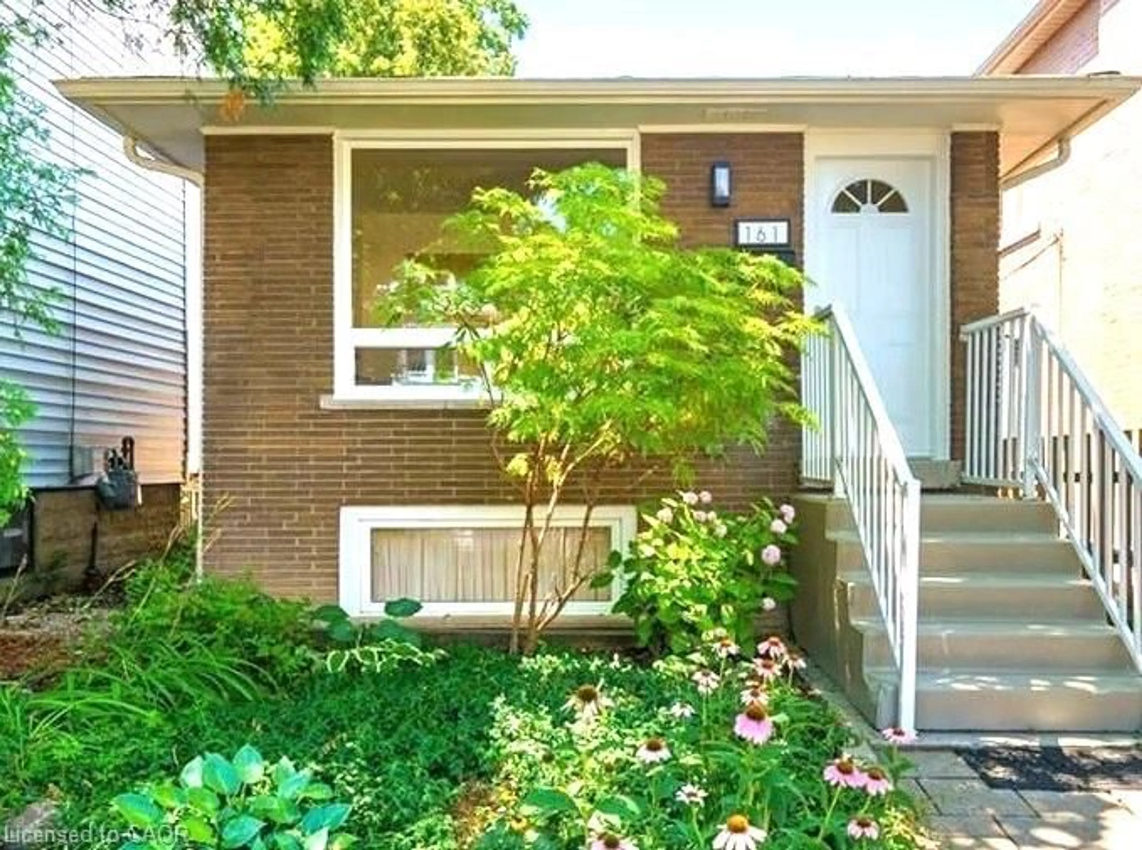 Home with brick exterior material, street for 161 Homewood Ave, Hamilton Ontario L8P 2M6