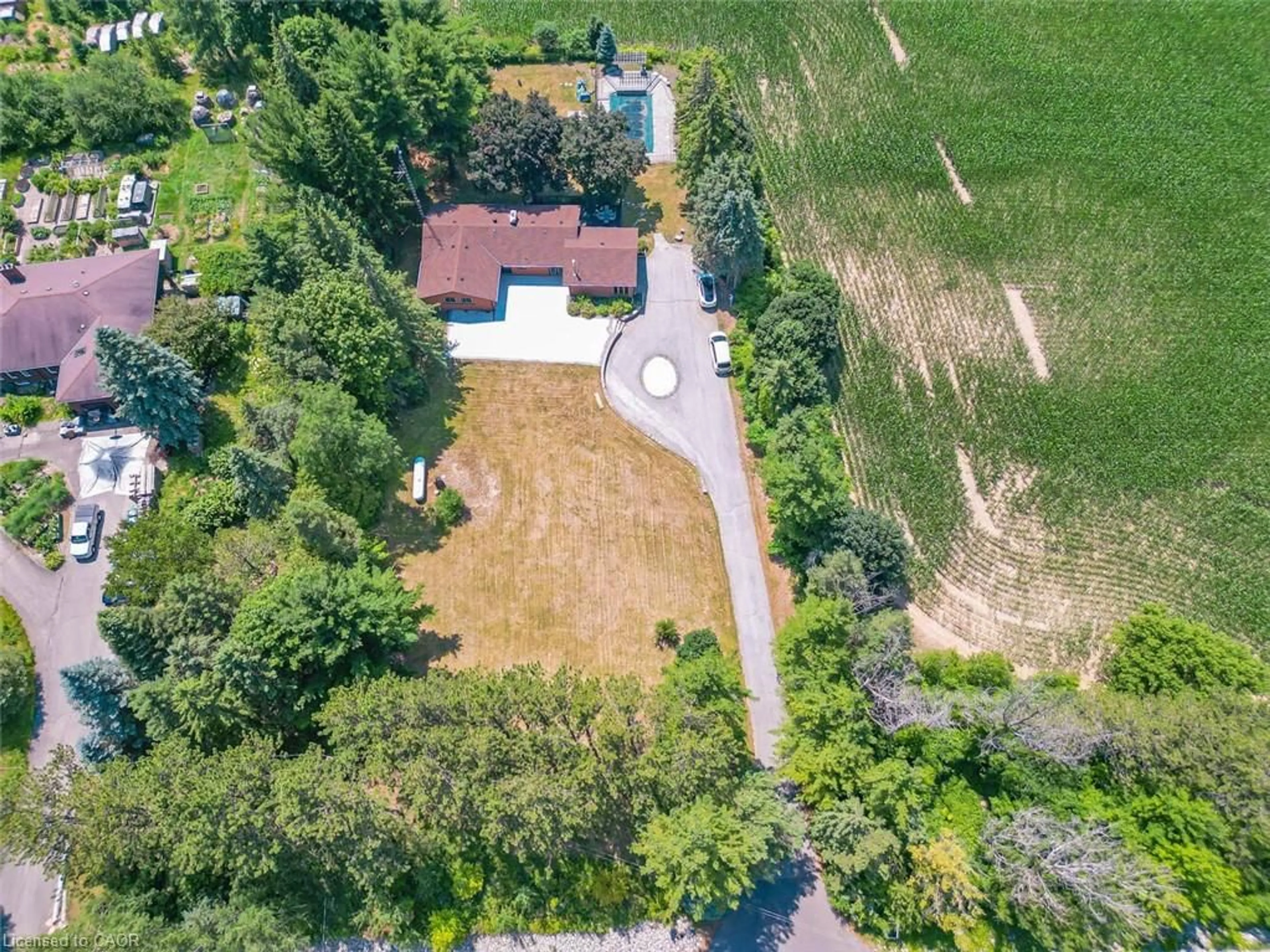 A pic from outside/outdoor area/front of a property/back of a property/a pic from drone, street for 14812 Centreville Creek Rd, Caledon Ontario L7C 3B1