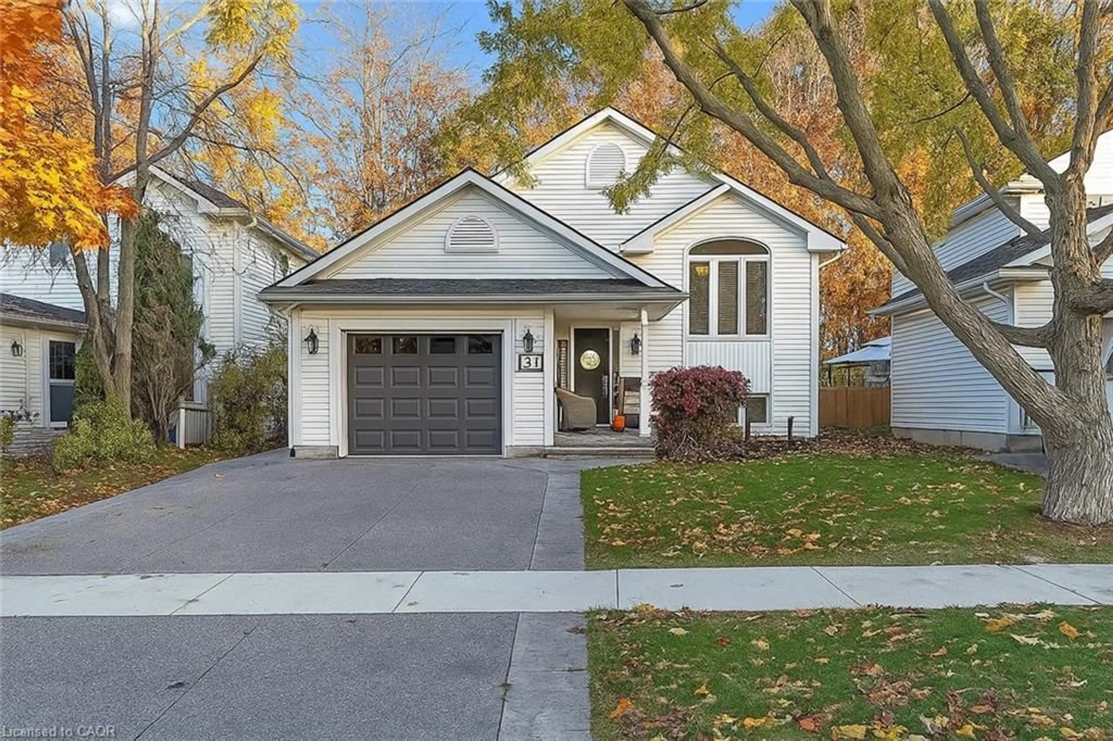 Home with vinyl exterior material, street for 54 Morgan Dr, Caledonia Ontario N3W 1H7