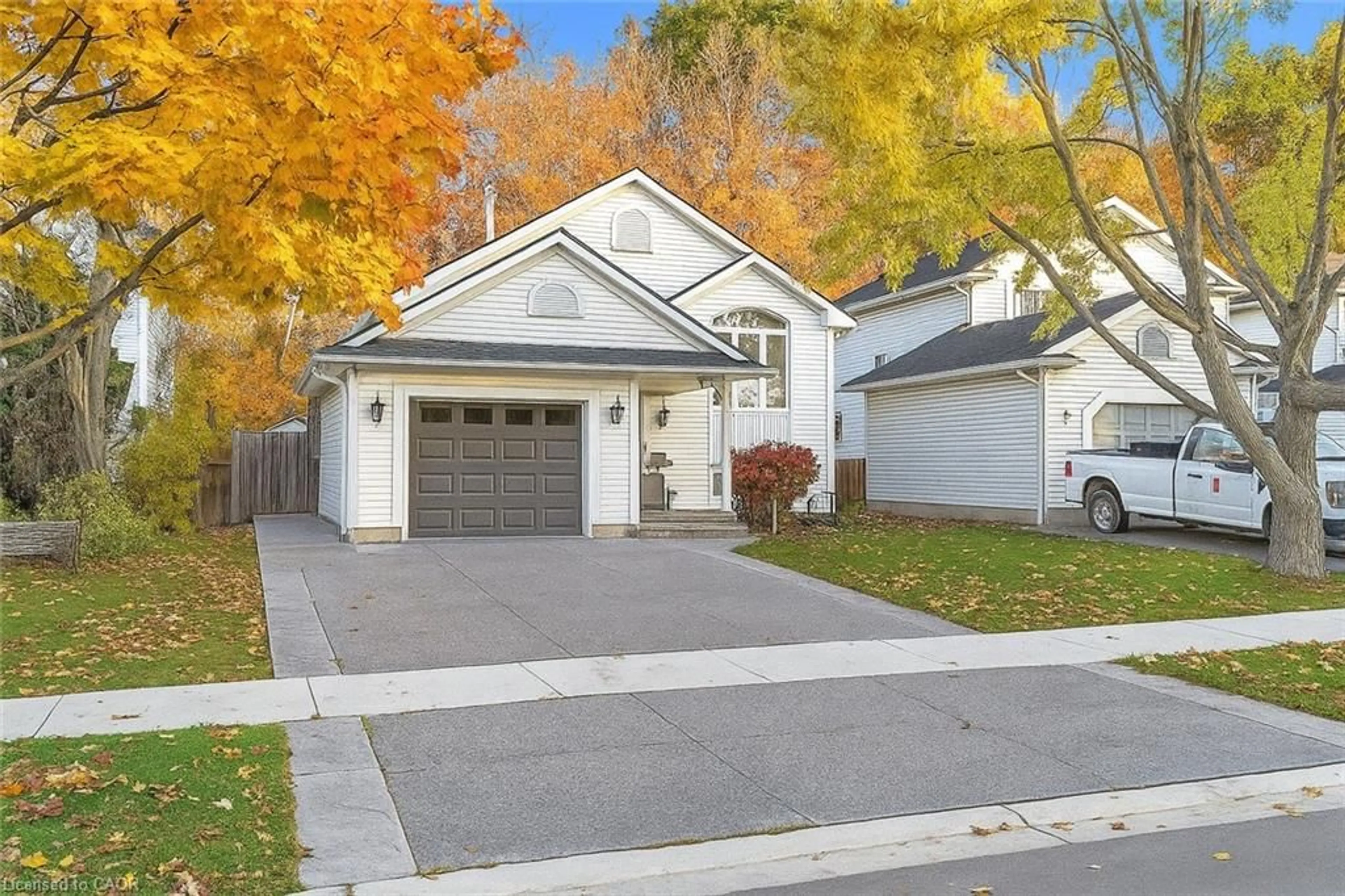 Home with vinyl exterior material, street for 54 Morgan Dr, Caledonia Ontario N3W 1H7