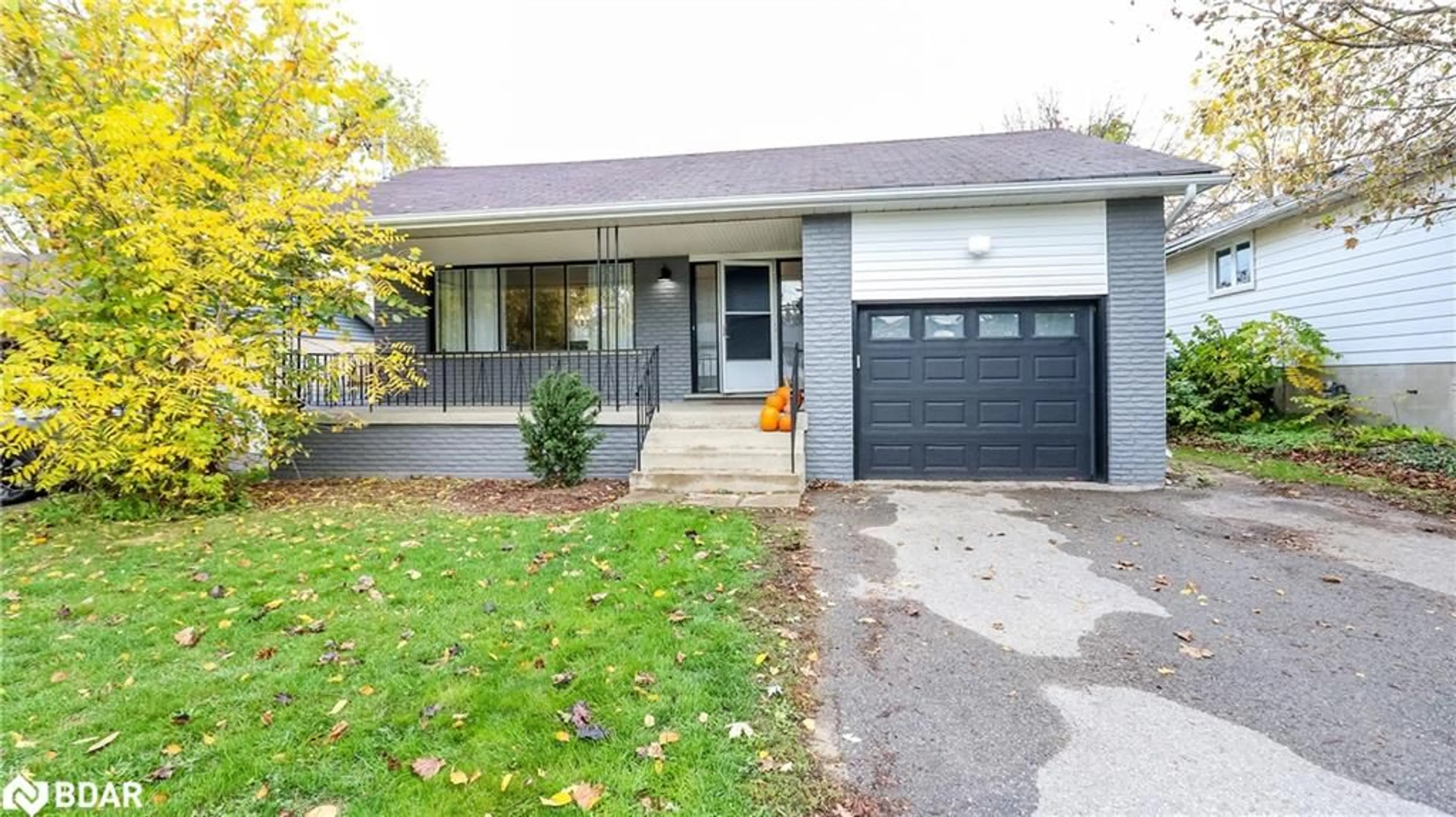 Home with vinyl exterior material, street for 14 Steel St, Barrie Ontario L4M 2E5