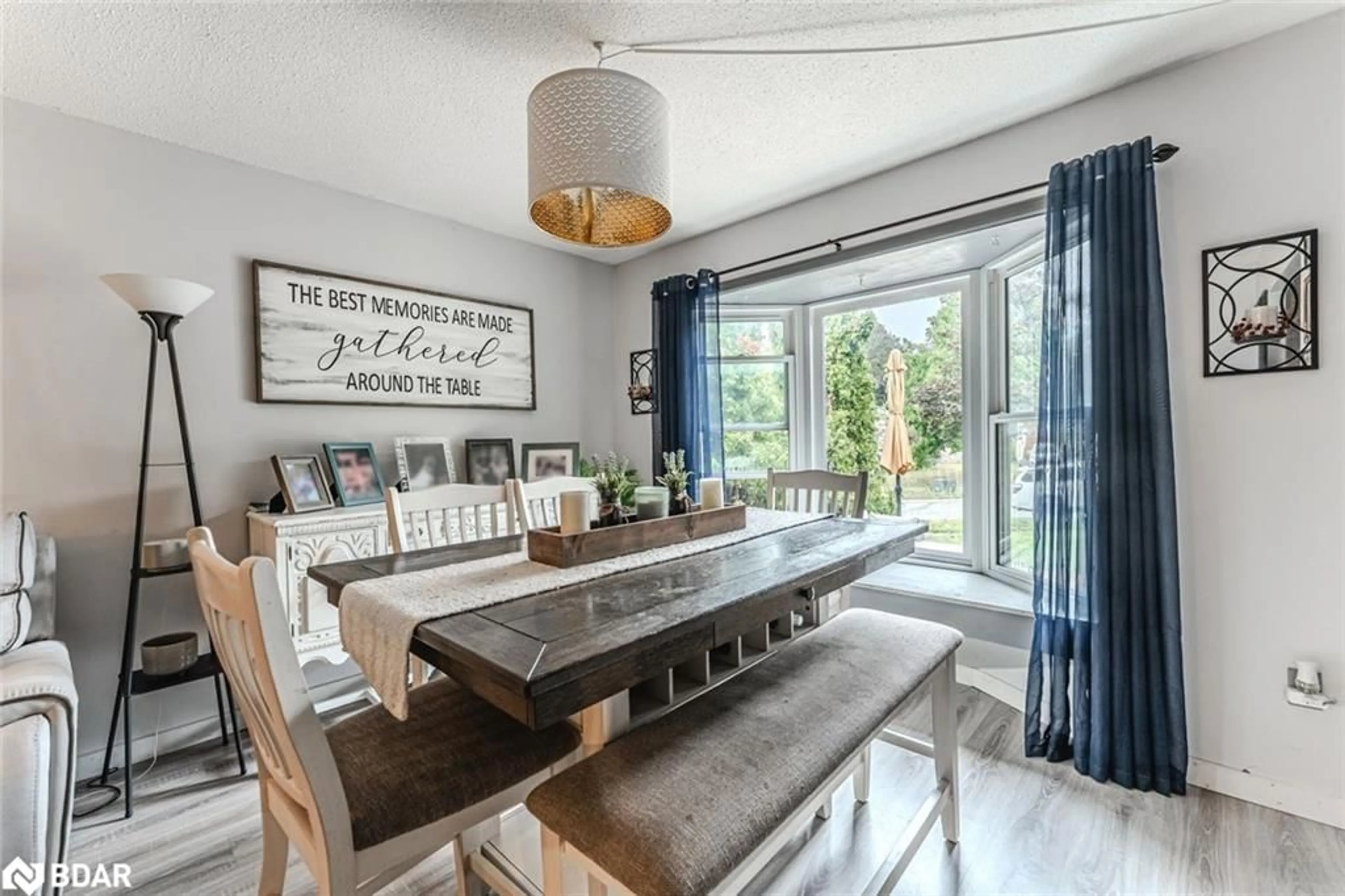 Dining room, wood/laminate floor for 69 Fox Run, Barrie Ontario L4N 5L6