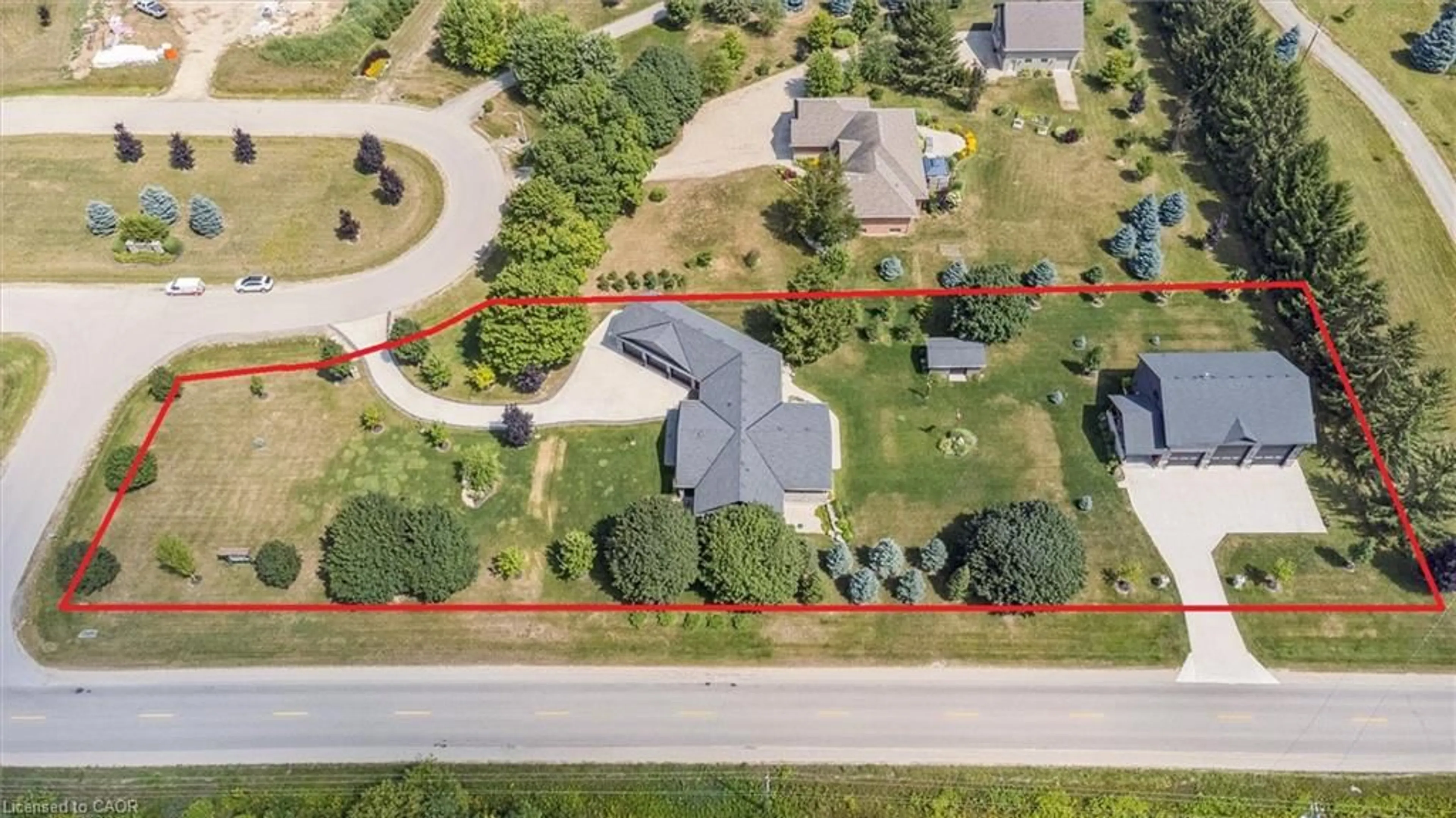 A pic from outside/outdoor area/front of a property/back of a property/a pic from drone, street for 100 Harris Cres, Mount Forest Ontario N0G 2L0