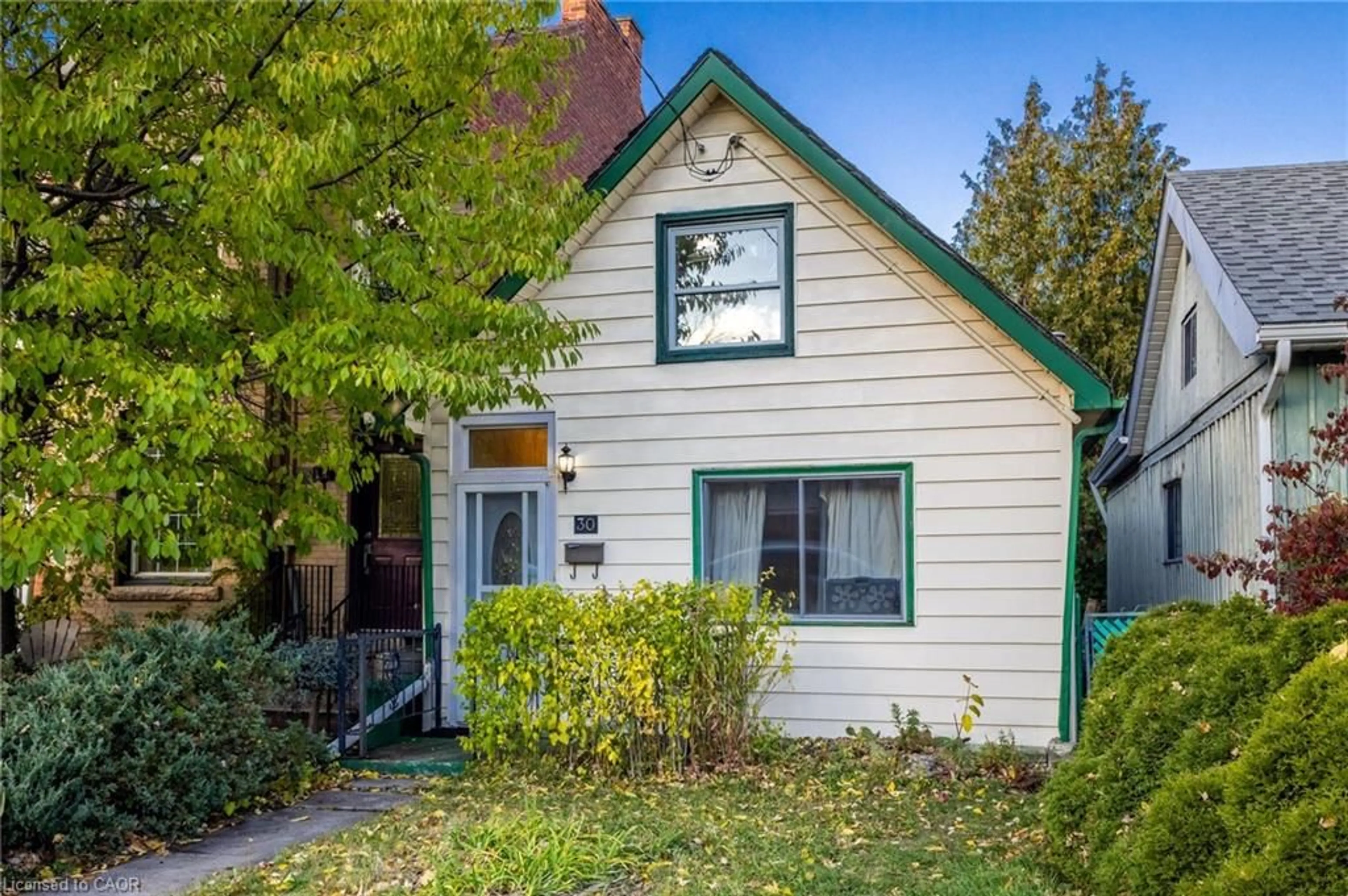 Home with vinyl exterior material, street for 30 Chatham St, Hamilton Ontario L8P 2B4