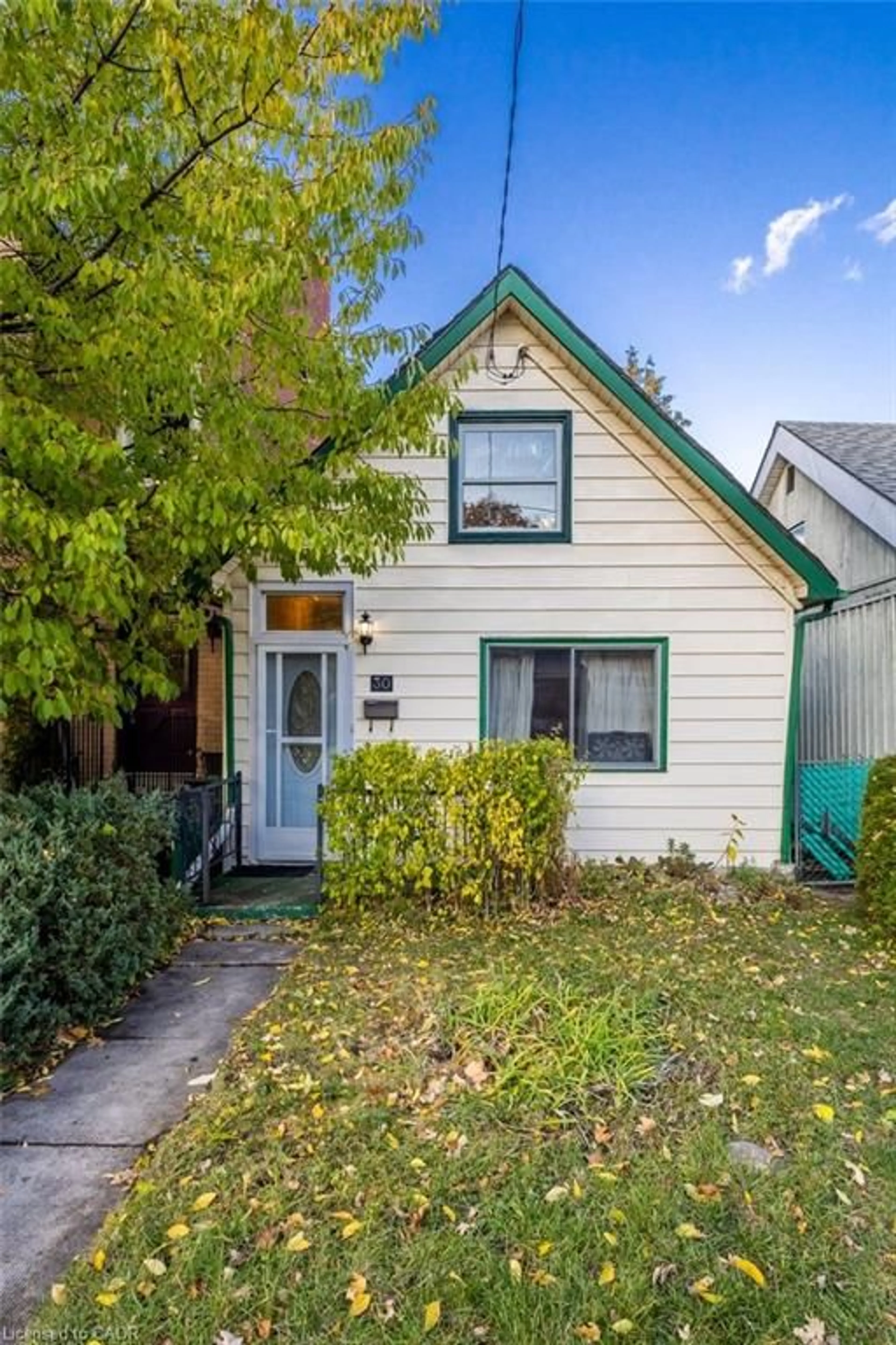 Home with vinyl exterior material, street for 30 Chatham St, Hamilton Ontario L8P 2B4