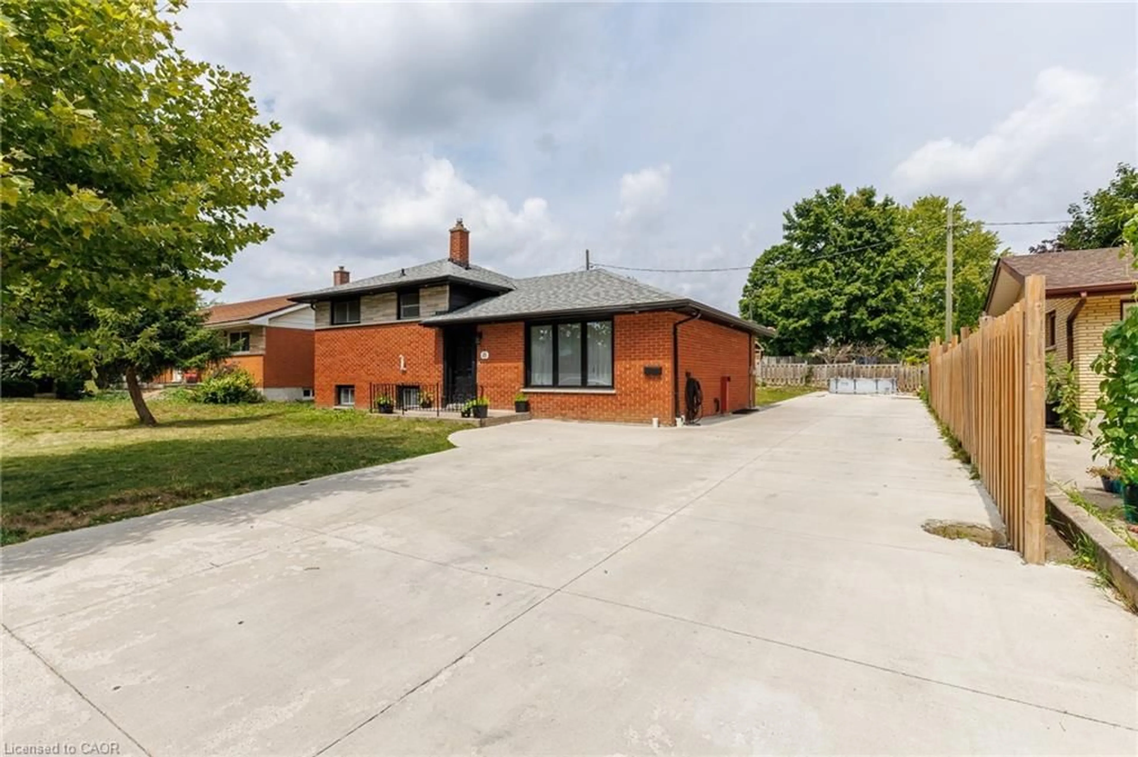 Home with brick exterior material, street for 18 Silverdale Cres, London Ontario N5Z 4A4