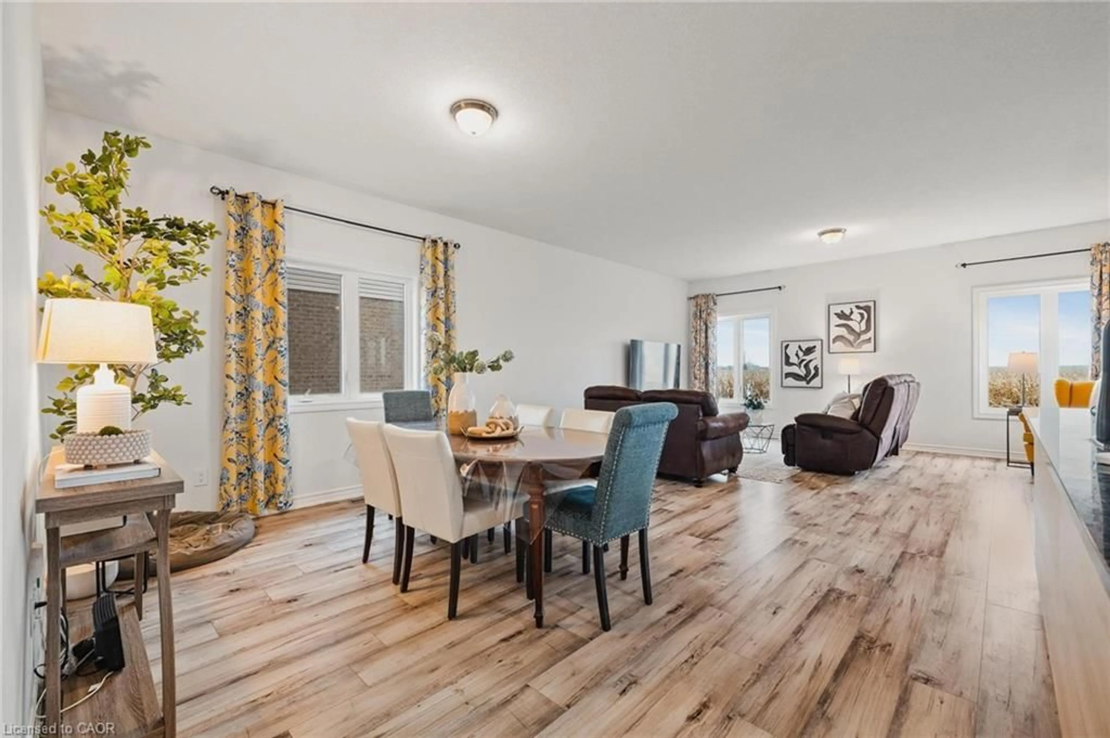 Living room with furniture, wood/laminate floor for 126 Maple St, Drayton Ontario N0G 1P0