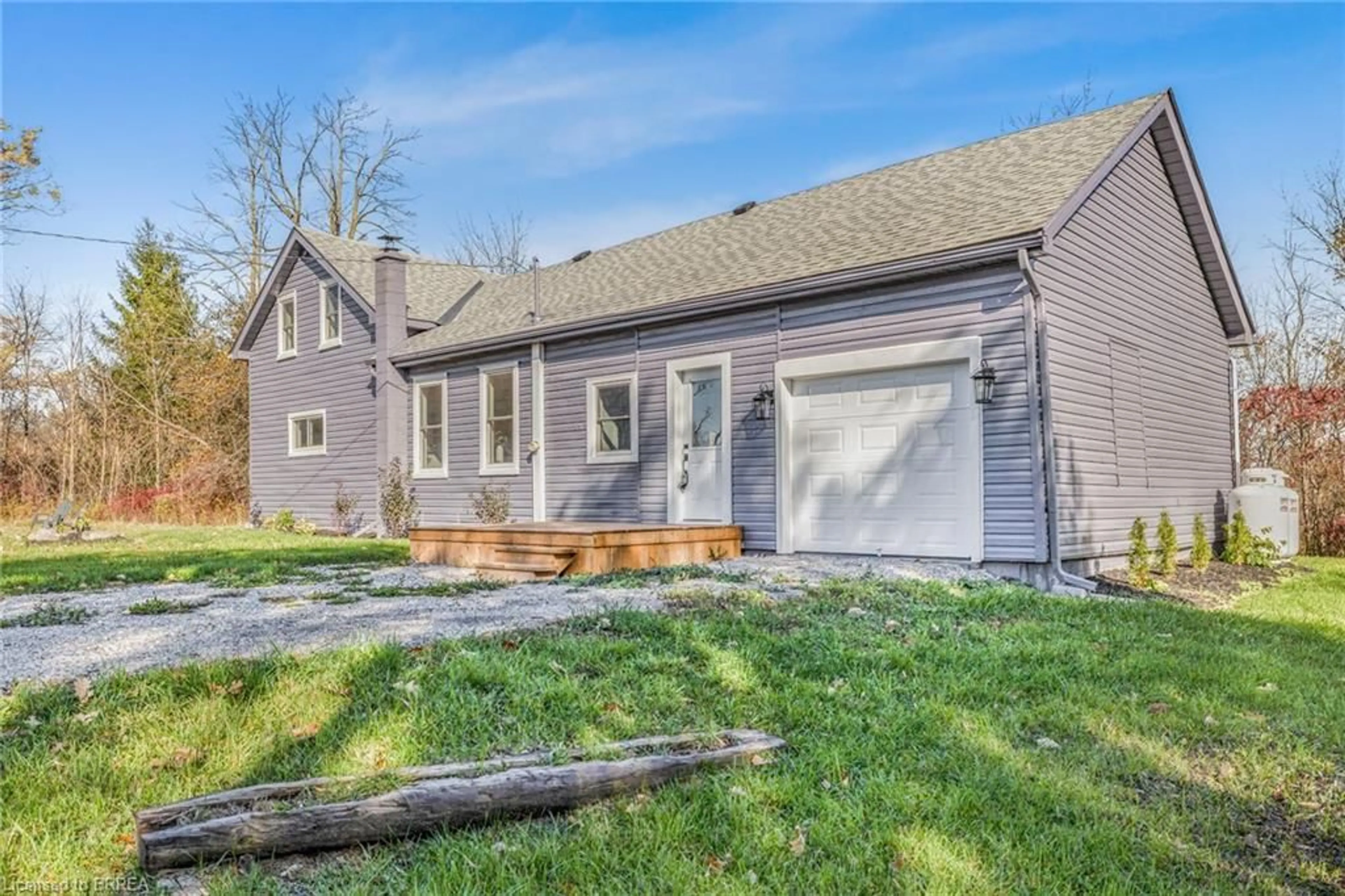 Home with vinyl exterior material, street for 52 Main Street Rockford, Rockford Ontario N0E 1Y0