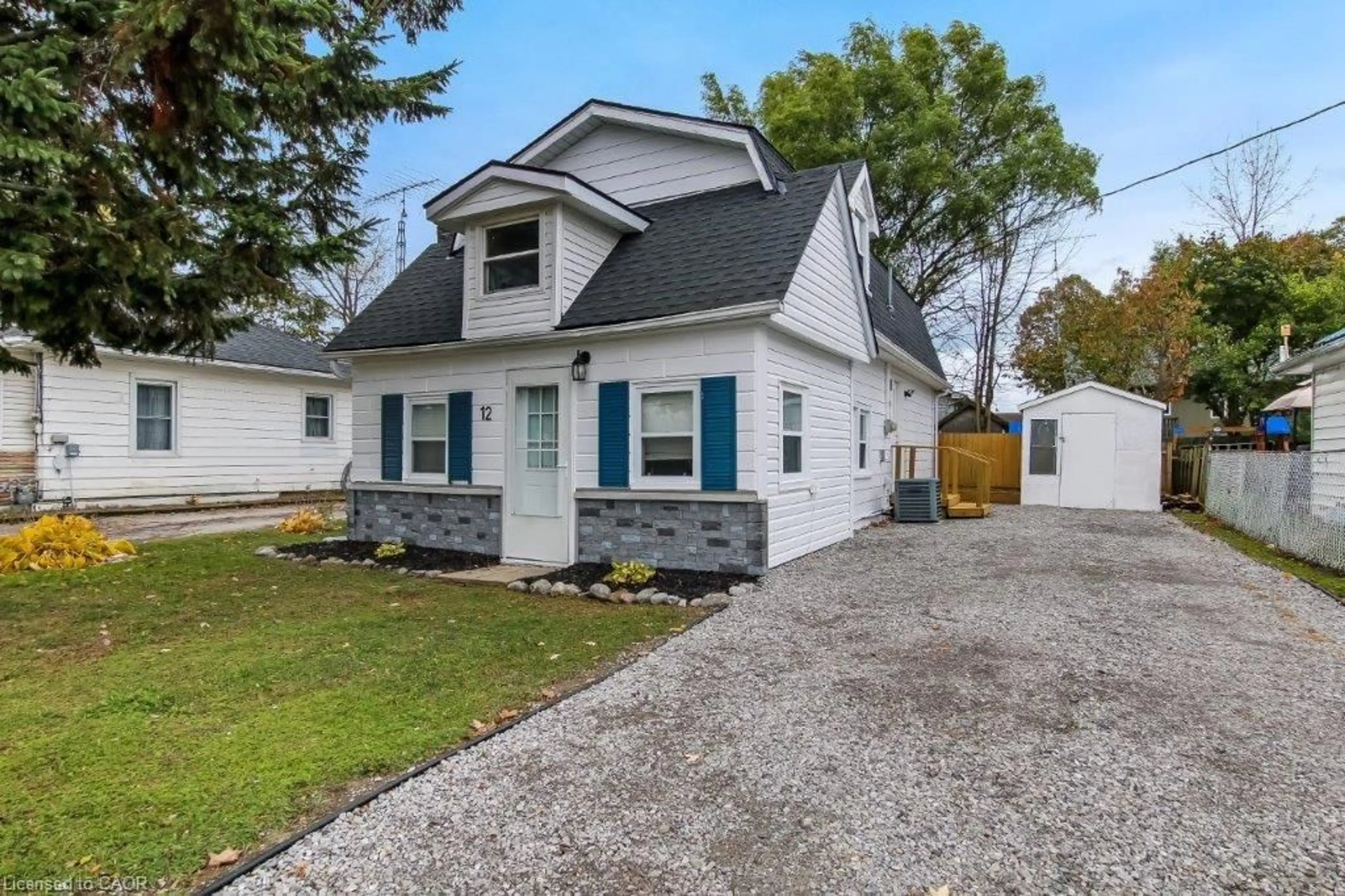 Home with vinyl exterior material, street for 12 Pansy Ave, Port Dover Ontario N0A 1N7