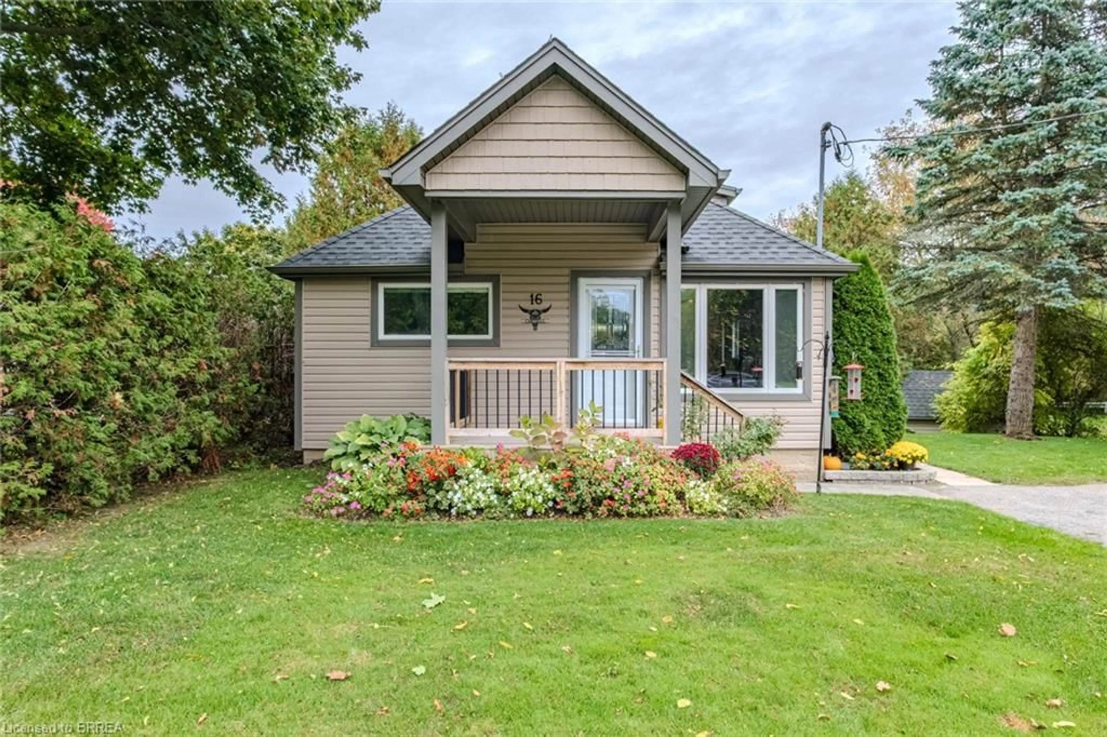 Home with vinyl exterior material, street for 16 First St, Mount Pleasant Ontario N0E 1K0