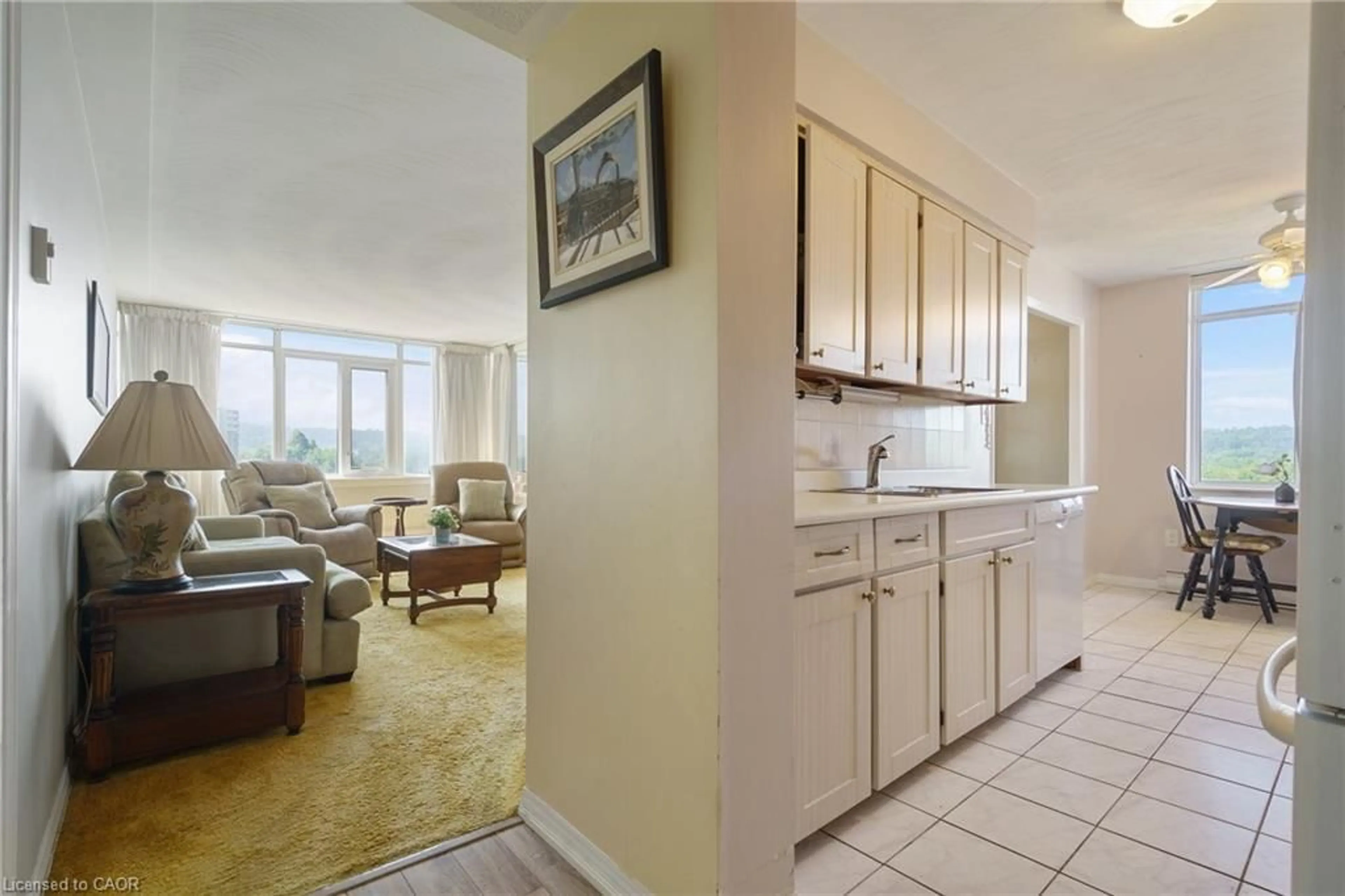 Living room with furniture, ceramic/tile floor for 30 Harrisford St #908, Hamilton Ontario L8K 6N1