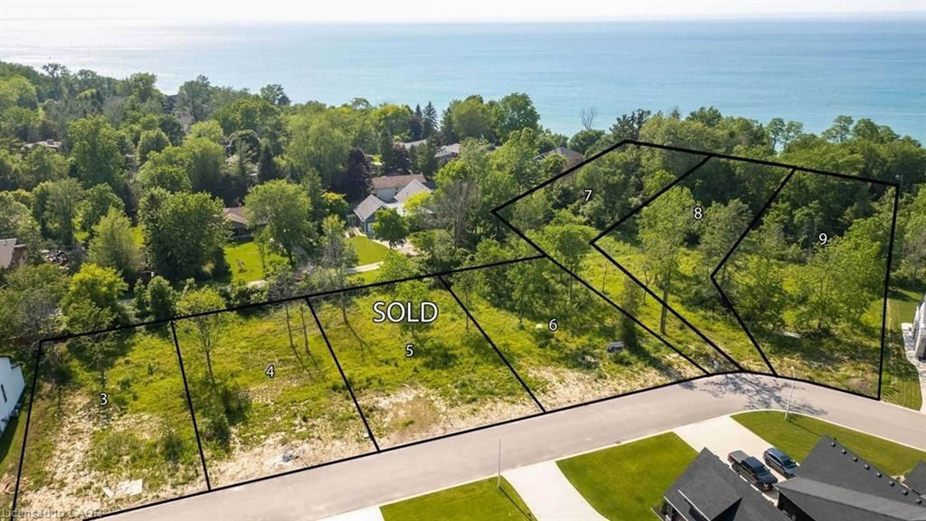A pic from outside/outdoor area/front of a property/back of a property/a pic from drone, water/lake/river/ocean view for 7049 Blue Coast Hts, Plympton-Wyoming Ontario N0N 1E0