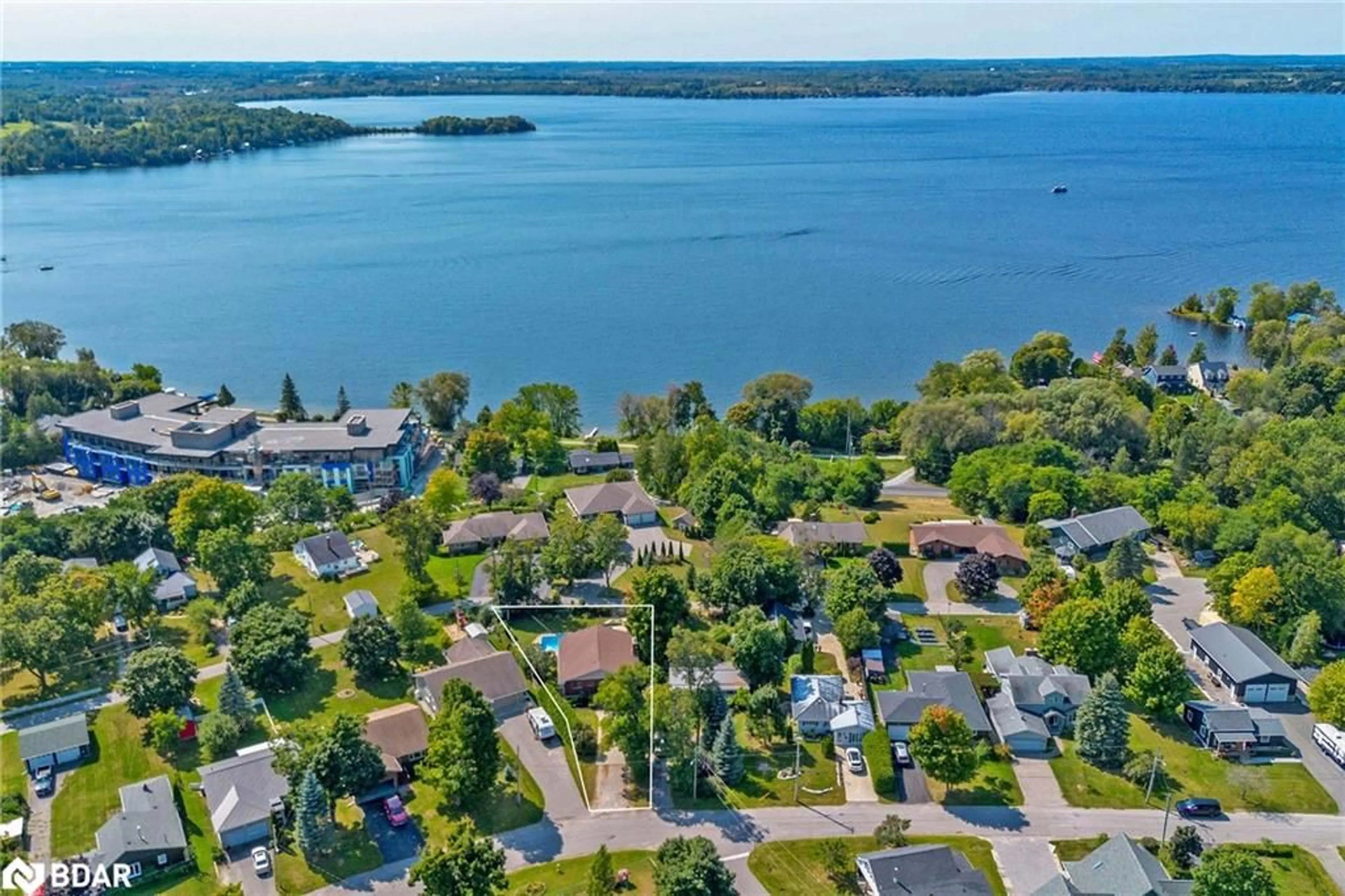 A pic from outside/outdoor area/front of a property/back of a property/a pic from drone, water/lake/river/ocean view for 121 Queen Street St, Fenelon Falls Ontario K0M 1N0