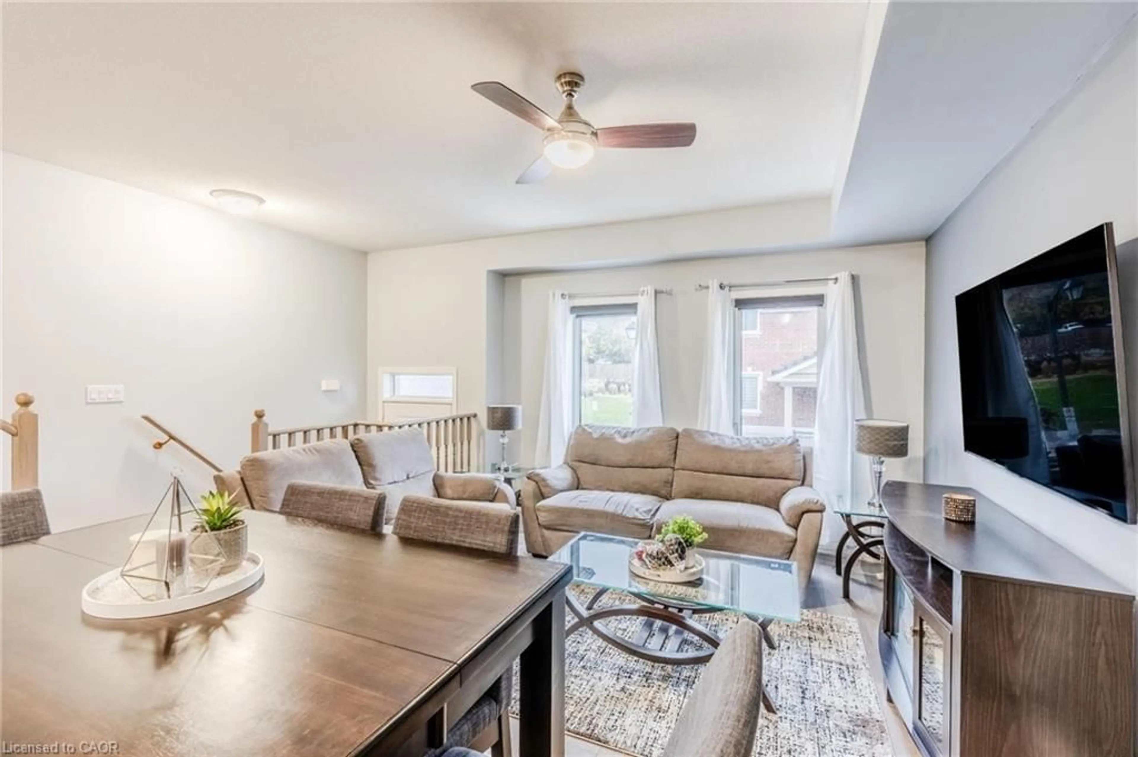 Living room with furniture, wood/laminate floor for 4 Dunsley Way, Whitby Ontario L1N 0L5