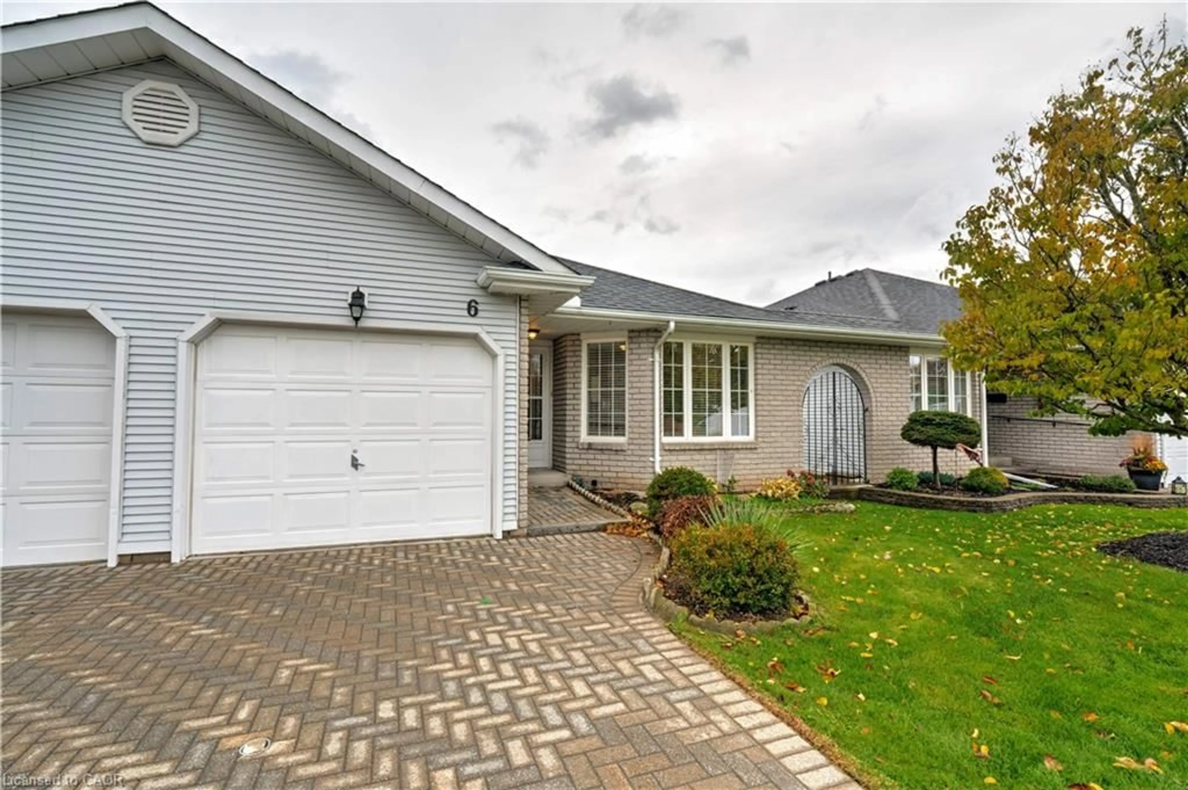 Home with vinyl exterior material, street for 6 Village Dr, Smithville Ontario L0R 2A0