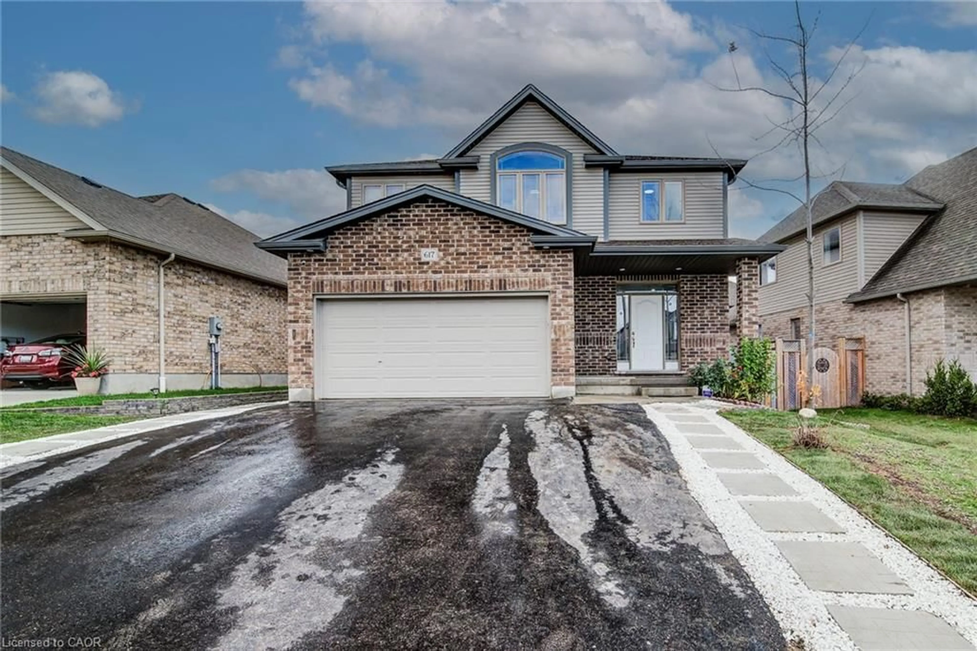 Home with brick exterior material, street for 617 Thorndale Dr, Waterloo Ontario N2T 0A9