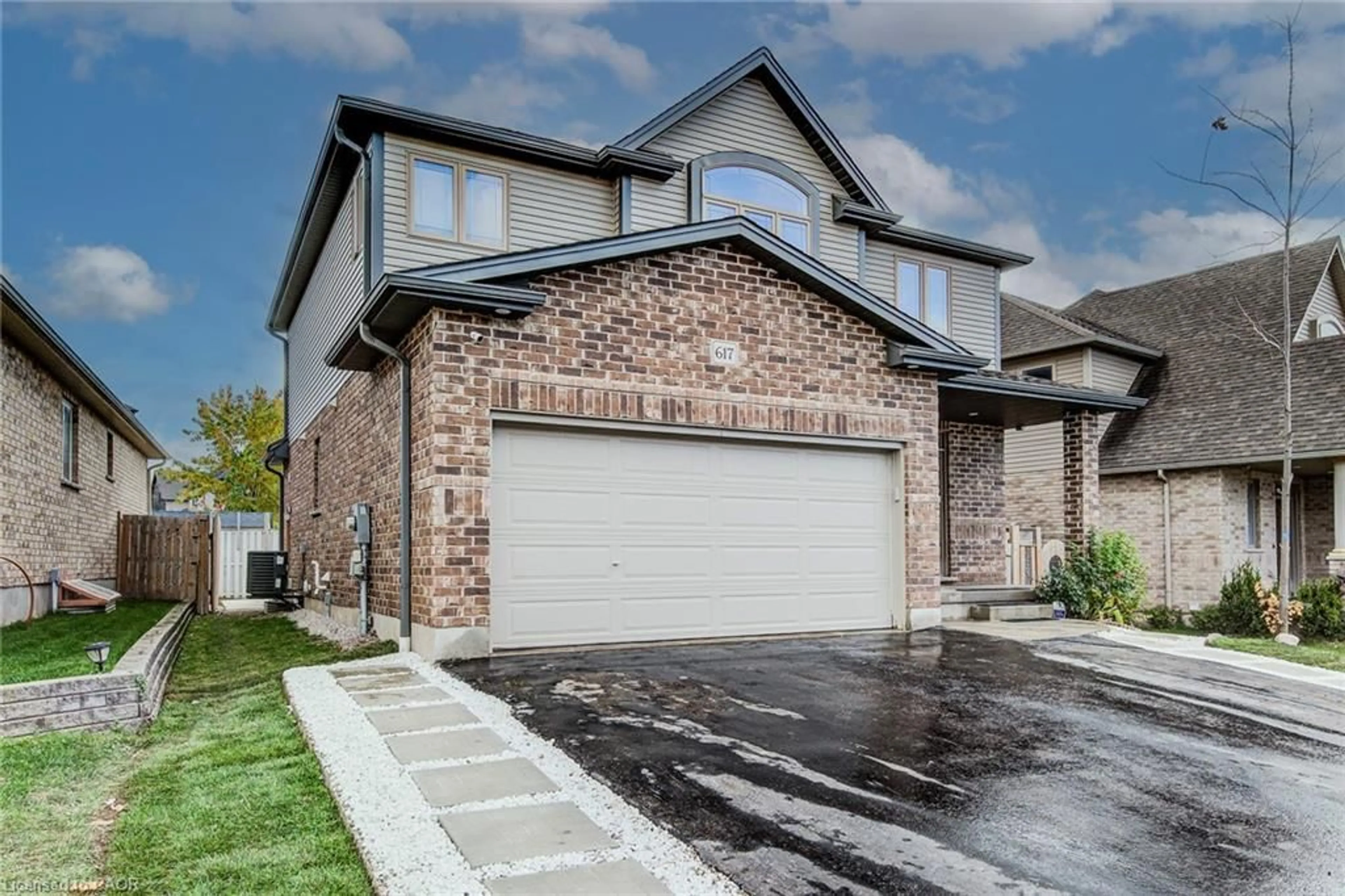 Home with brick exterior material, street for 617 Thorndale Dr, Waterloo Ontario N2T 0A9