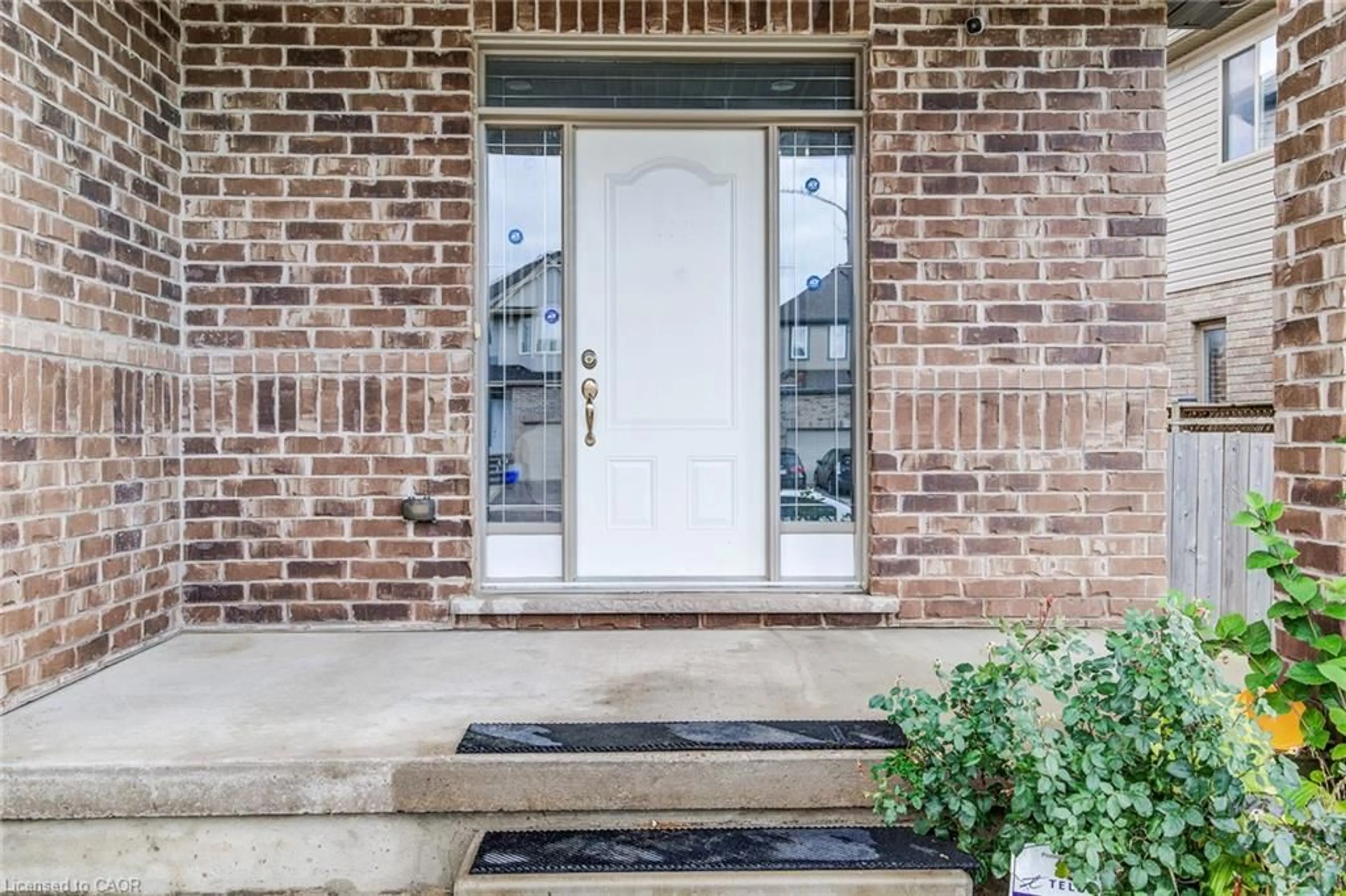 Home with brick exterior material, street for 617 Thorndale Dr, Waterloo Ontario N2T 0A9