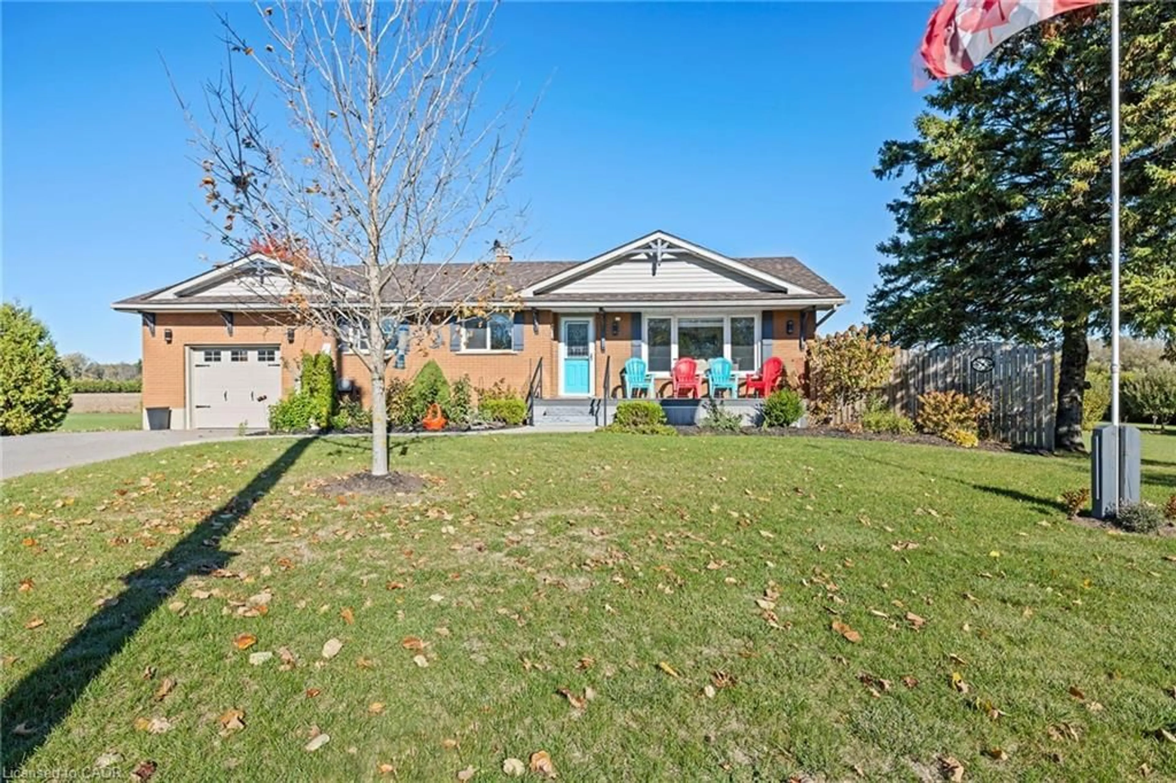 A pic from outside/outdoor area/front of a property/back of a property/a pic from drone, street for 1637 Windham Road 7, R. R. #3 Rd, Vanessa Ontario N0E 1V0