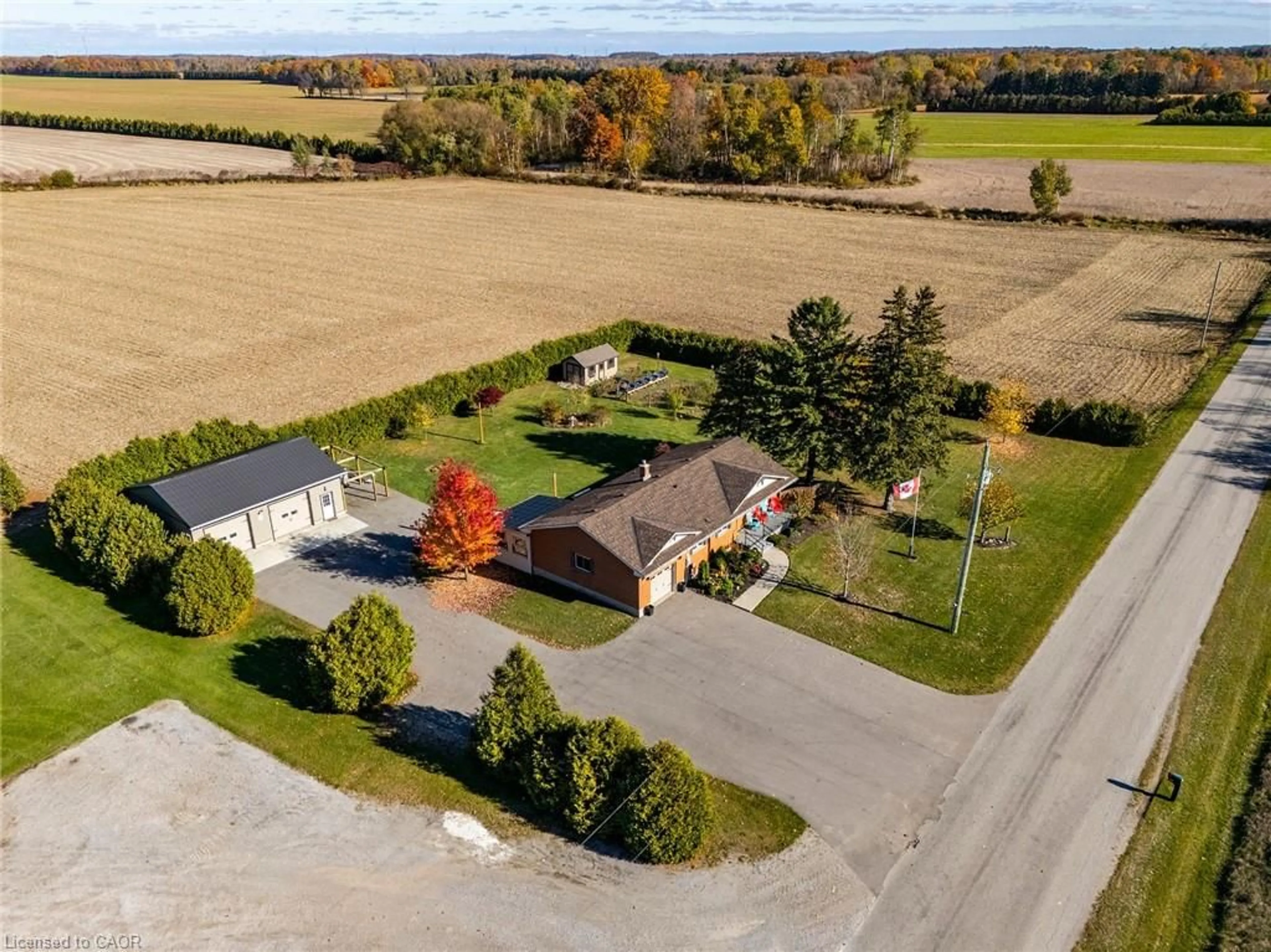A pic from outside/outdoor area/front of a property/back of a property/a pic from drone, street for 1637 Windham Road 7, R. R. #3 Rd, Vanessa Ontario N0E 1V0