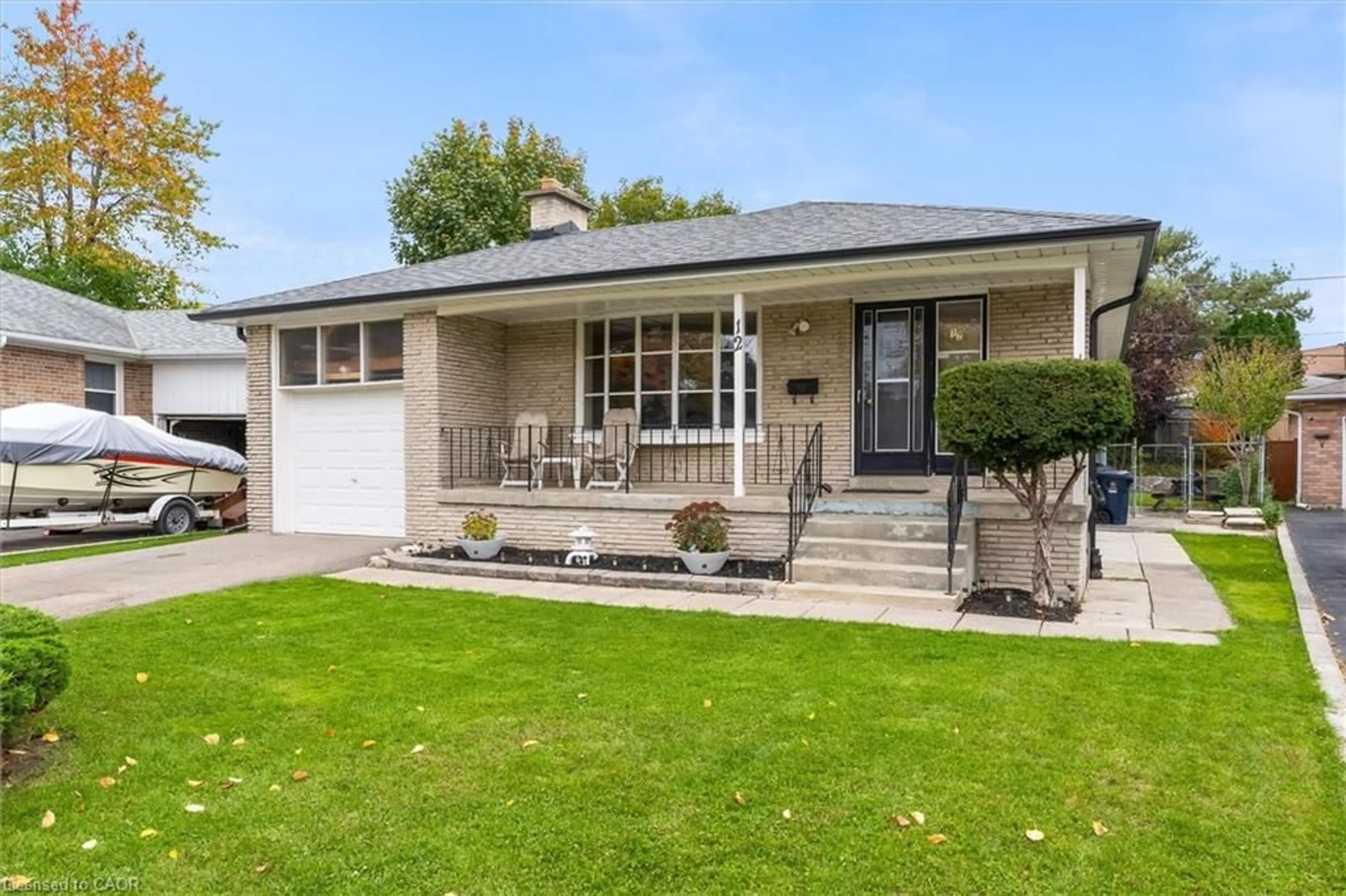 Home with vinyl exterior material, street for 12 Monet Ave, Etobicoke Ontario M9C 3N7