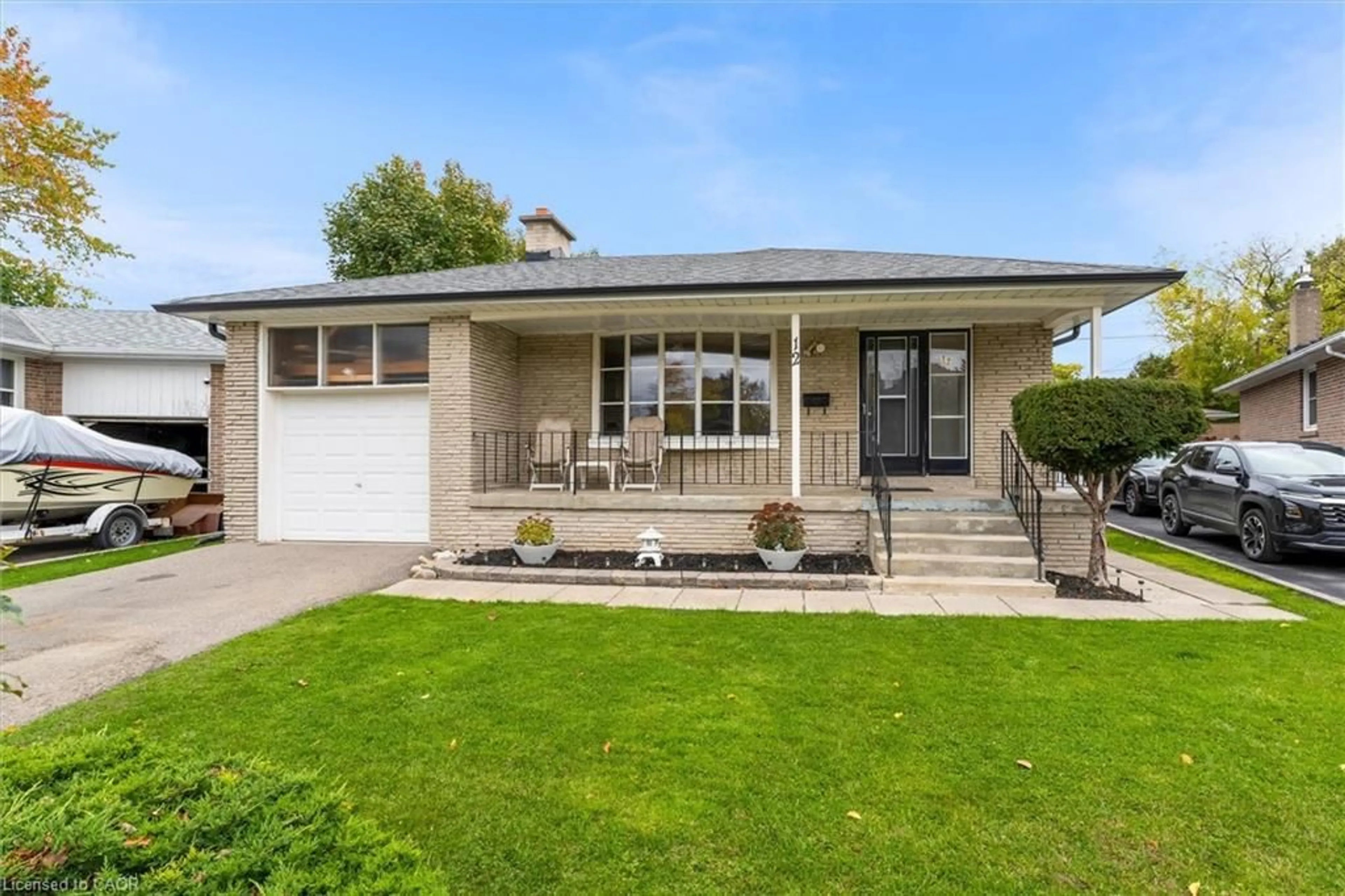 Home with vinyl exterior material, street for 12 Monet Ave, Etobicoke Ontario M9C 3N7