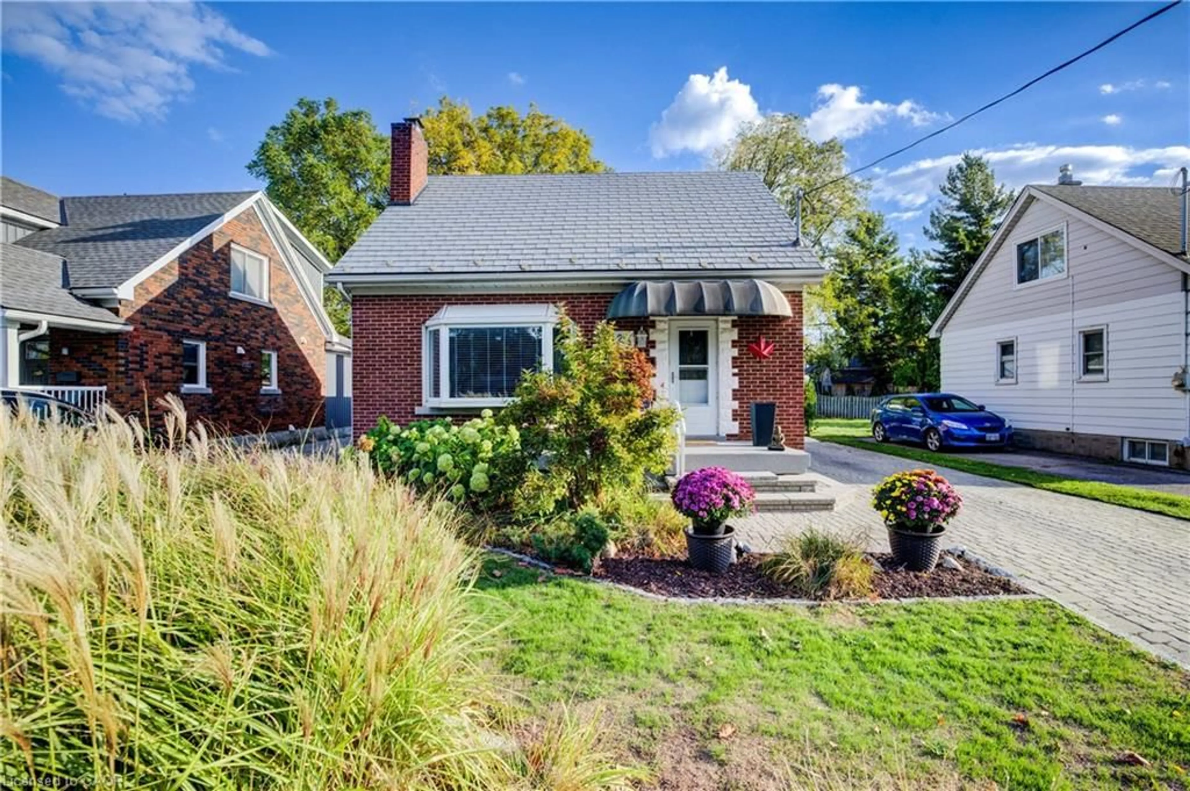 Home with brick exterior material, street for 129 Talbot St, Kitchener Ontario N2M 2B2